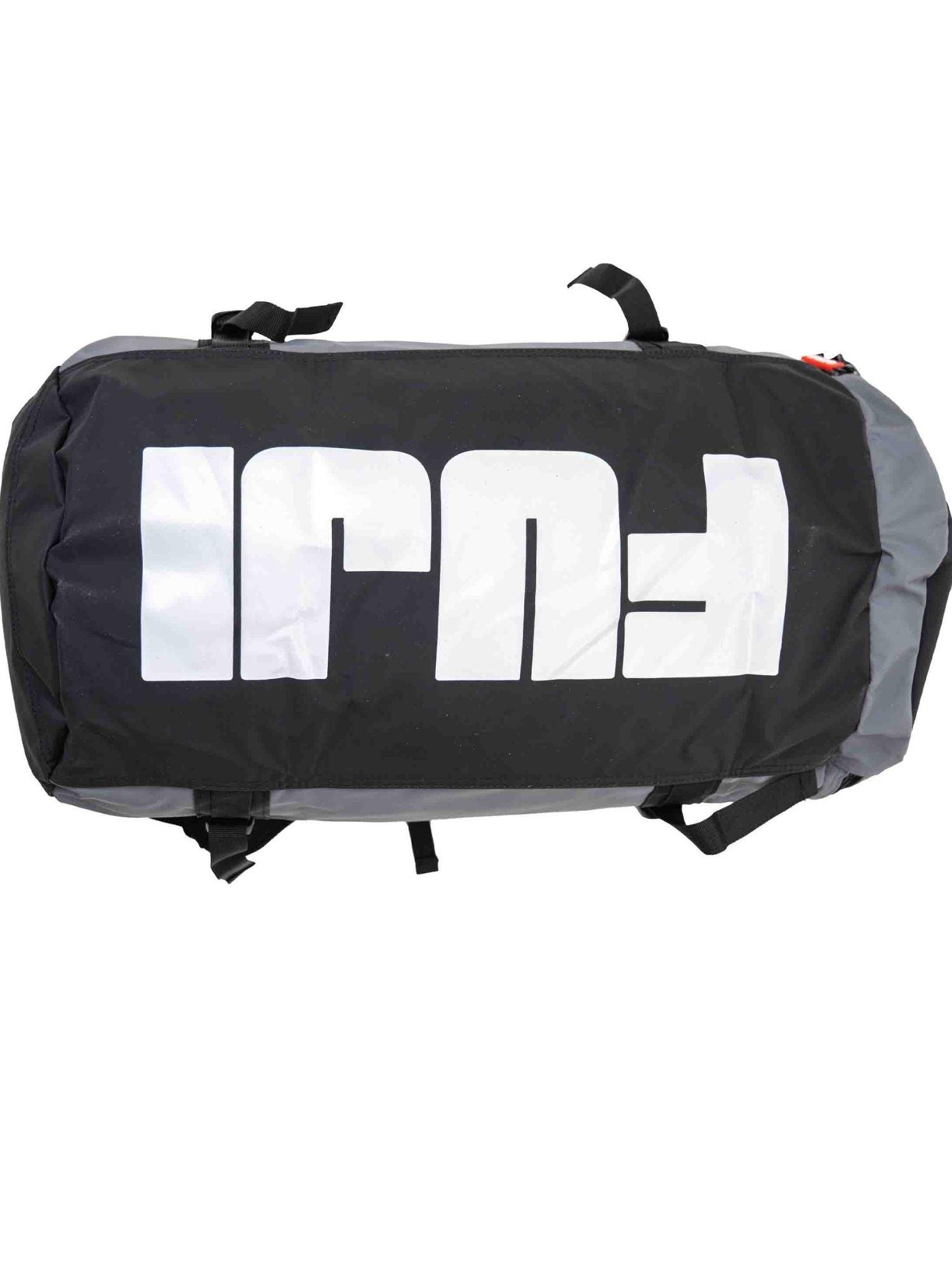 The Comp Convertible Backpack Duffle Grey features black and gray coloring, bold white "FUEL" text printed upside down on the side, adjustable straps, and a zippered closure.