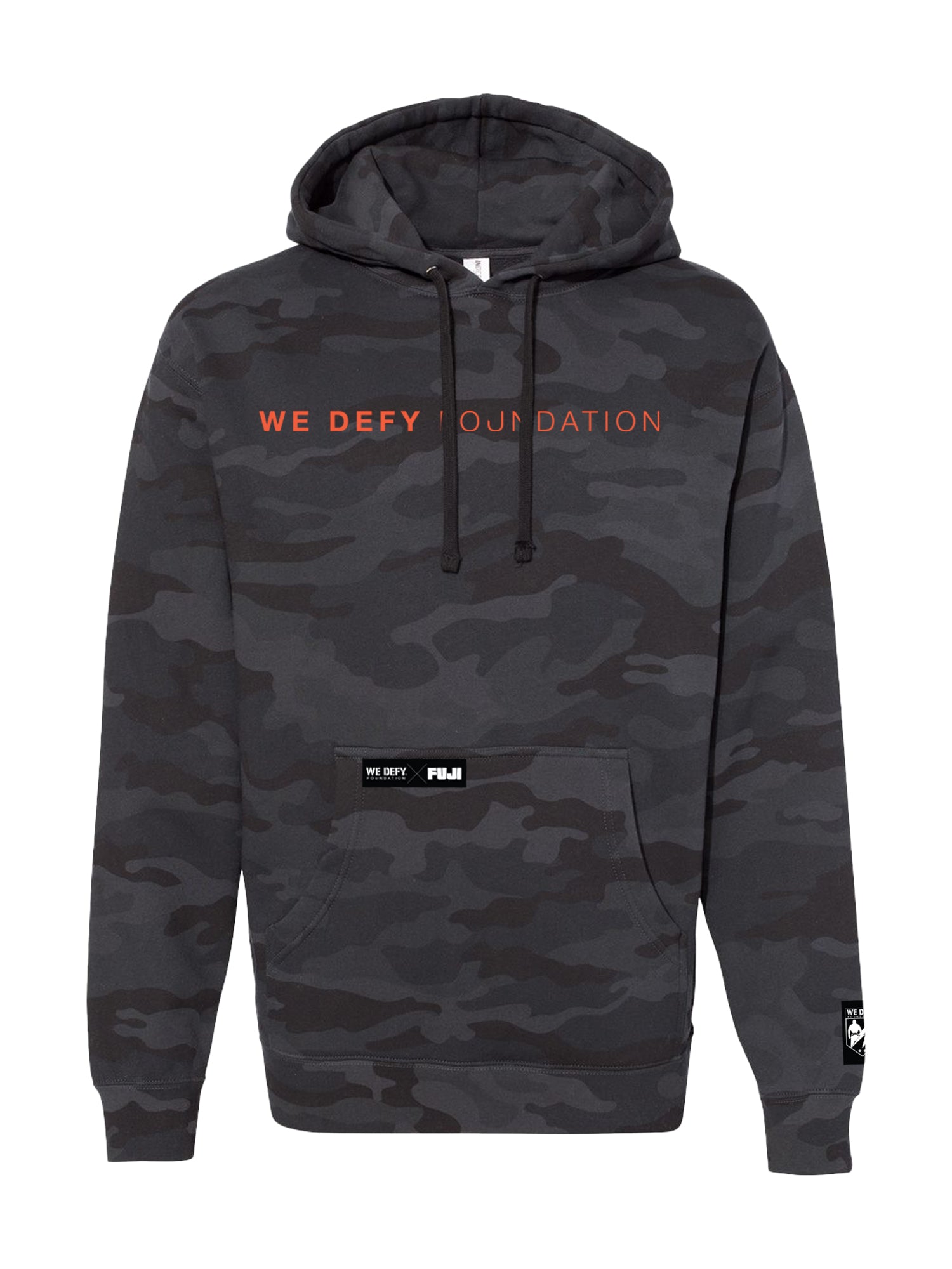 The We Defy Neon Camo Hoodie Black features a black and dark gray camo pattern with "WE DEFY FOUNDATION" in orange and white across the chest, plus small logo patches on the front pocket and lower sleeve.