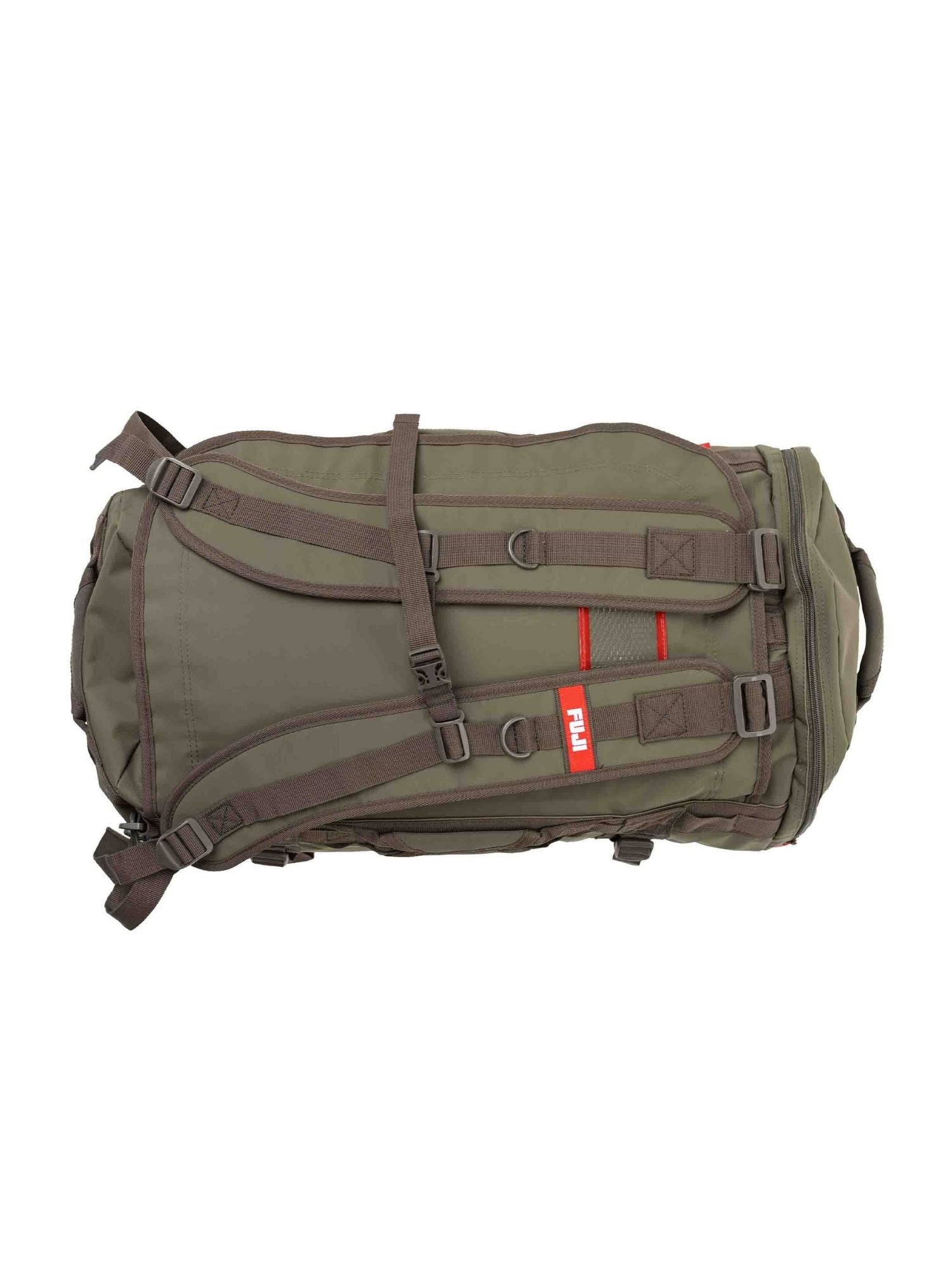 The Comp Convertible Backpack Duffle Military Green is shown horizontally against a white background, featuring black straps, red accents, and a side handle.