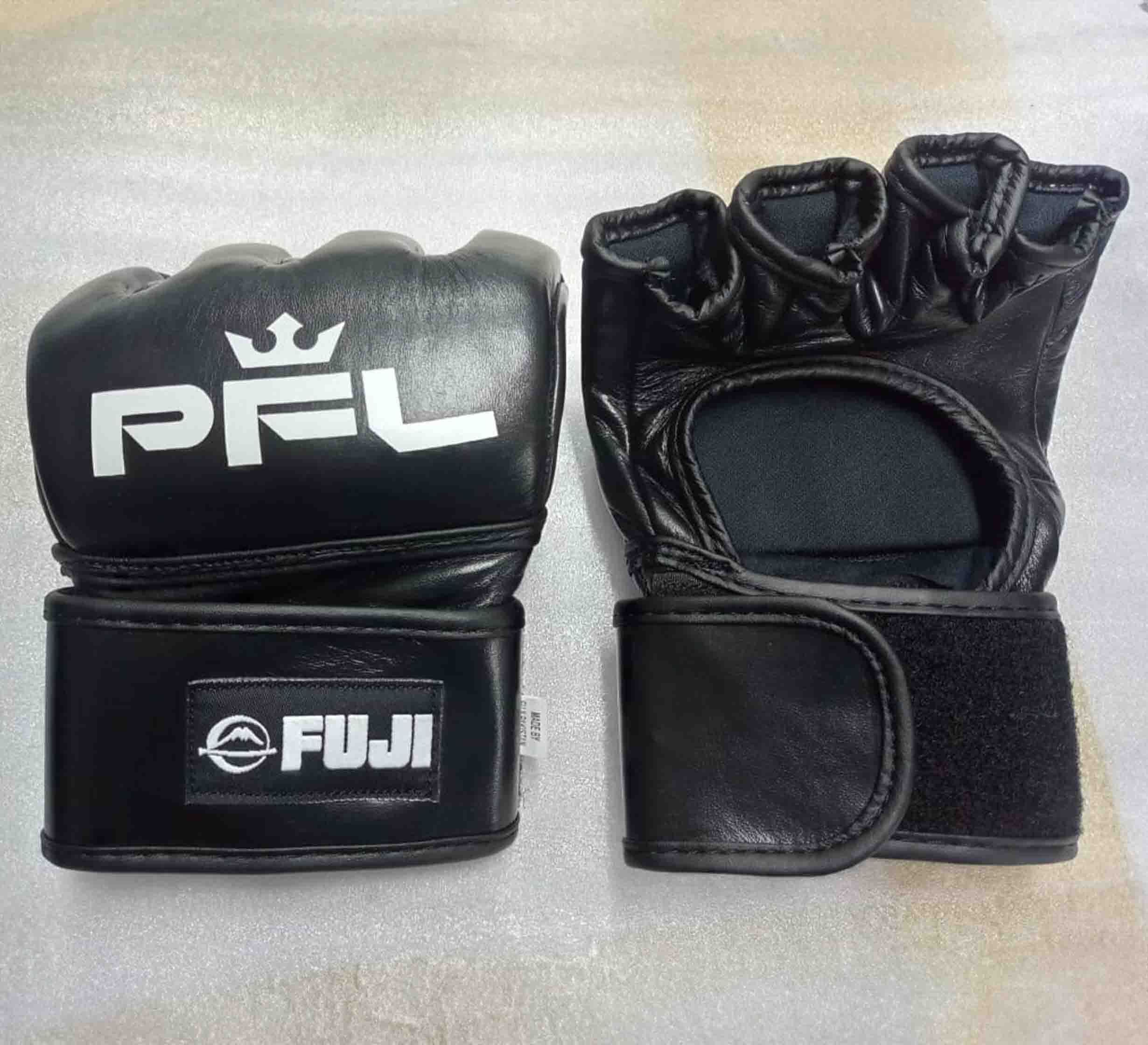 A pair of PFL MMA Gloves Black, featuring a crown and PFL on one glove, FUJI on the wrist strap; one glove shows the open finger and velcro palm up, the other is palm down.