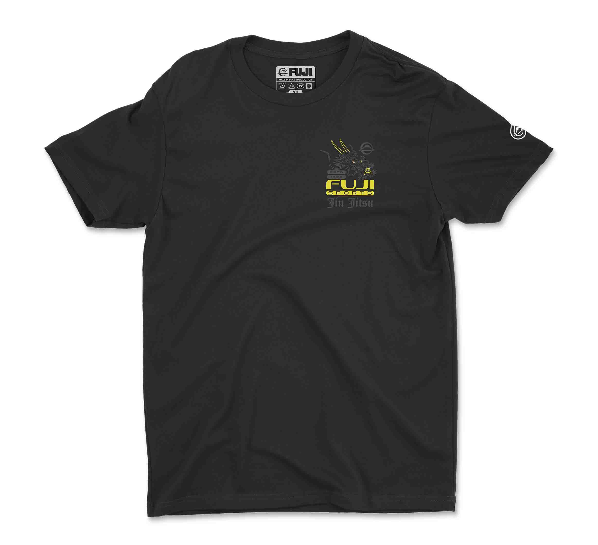 The Ryujin T-Shirt Black features short sleeves, a small yellow FUJI BJJ CLUB logo with hand design and subtle text on the left chest, plus a white circular logo on the right sleeve.