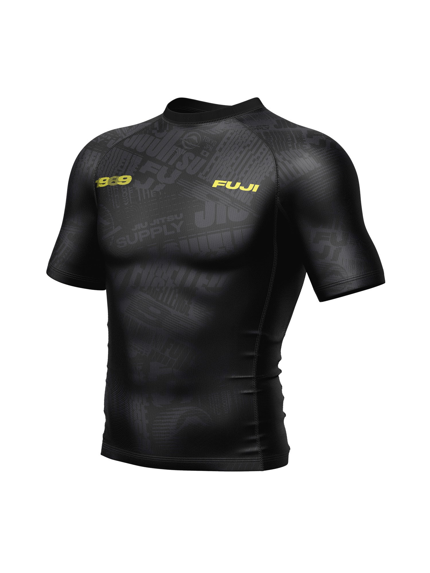 The Jiu jitsu Supply Flex Lite Rashguard Black is a short-sleeve athletic top with subtle graphic patterns and yellow "1969" and "FUJI" text on the chest, shown on a plain white background.