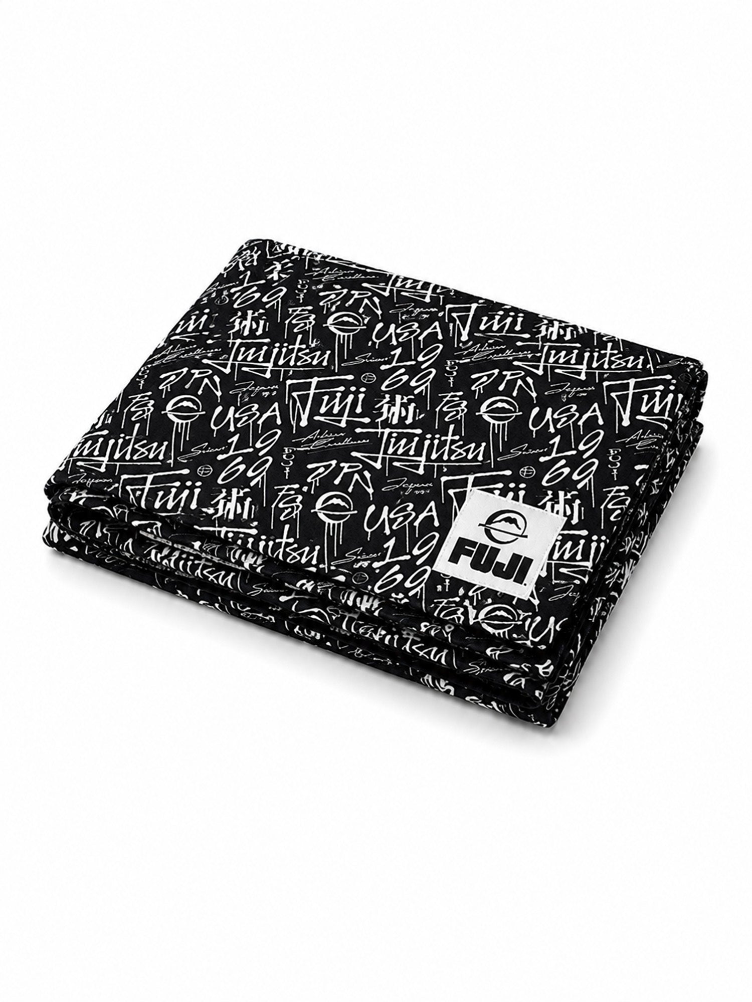A black Gym Towel featuring white Japanese writing and the FUJI logo patch on the front, displayed against a plain white background.