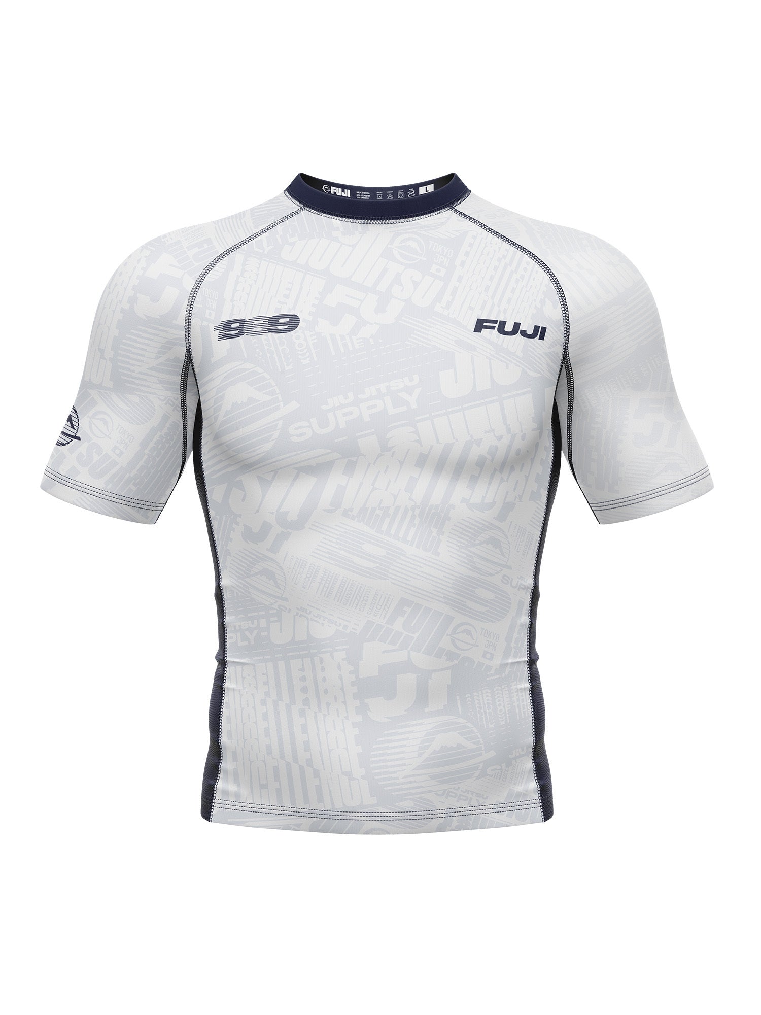 The Jiu jitsu Supply Flex Lite Rashguard White is a short-sleeved, white athletic top with grey patterns and text, black seam trim, and "FUJI" plus "1969" printed on the chest.