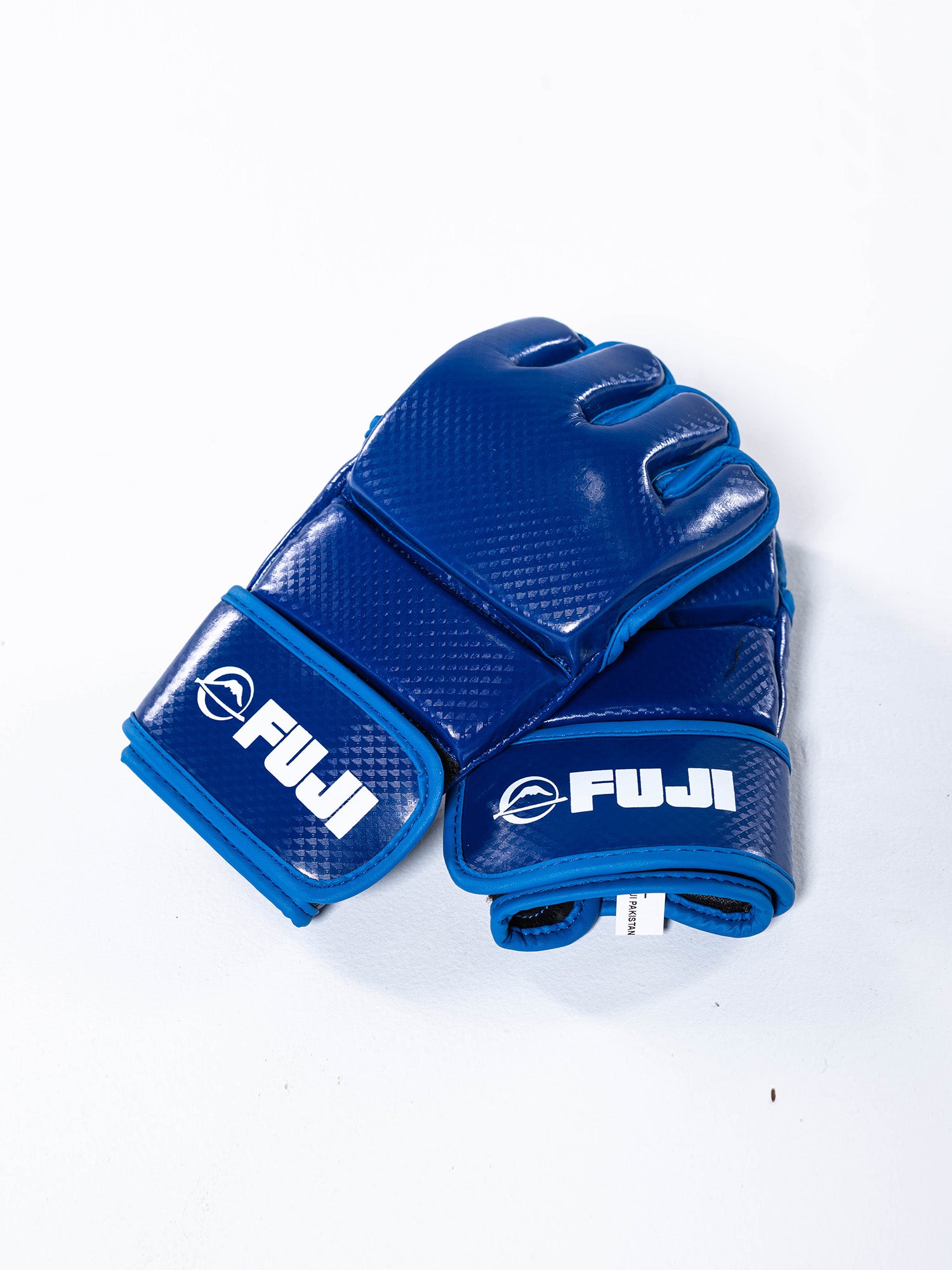 A pair of blue FIAS Sambo Combat Gloves with an open-finger design, stacked on top of each other against a white background.