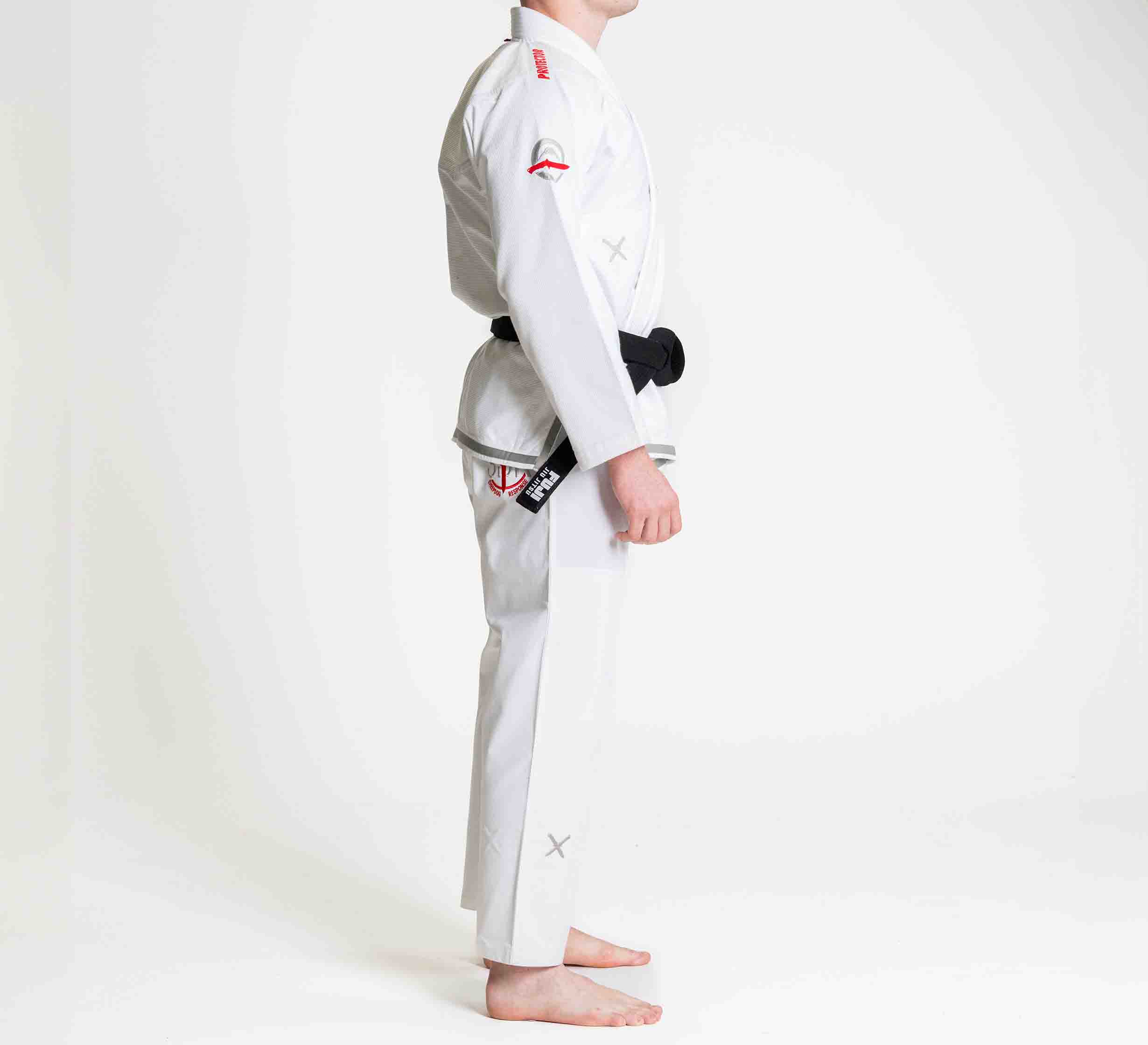 A man wearing the Suparaito BJJ Gi Sheepdog Response Edition in white.