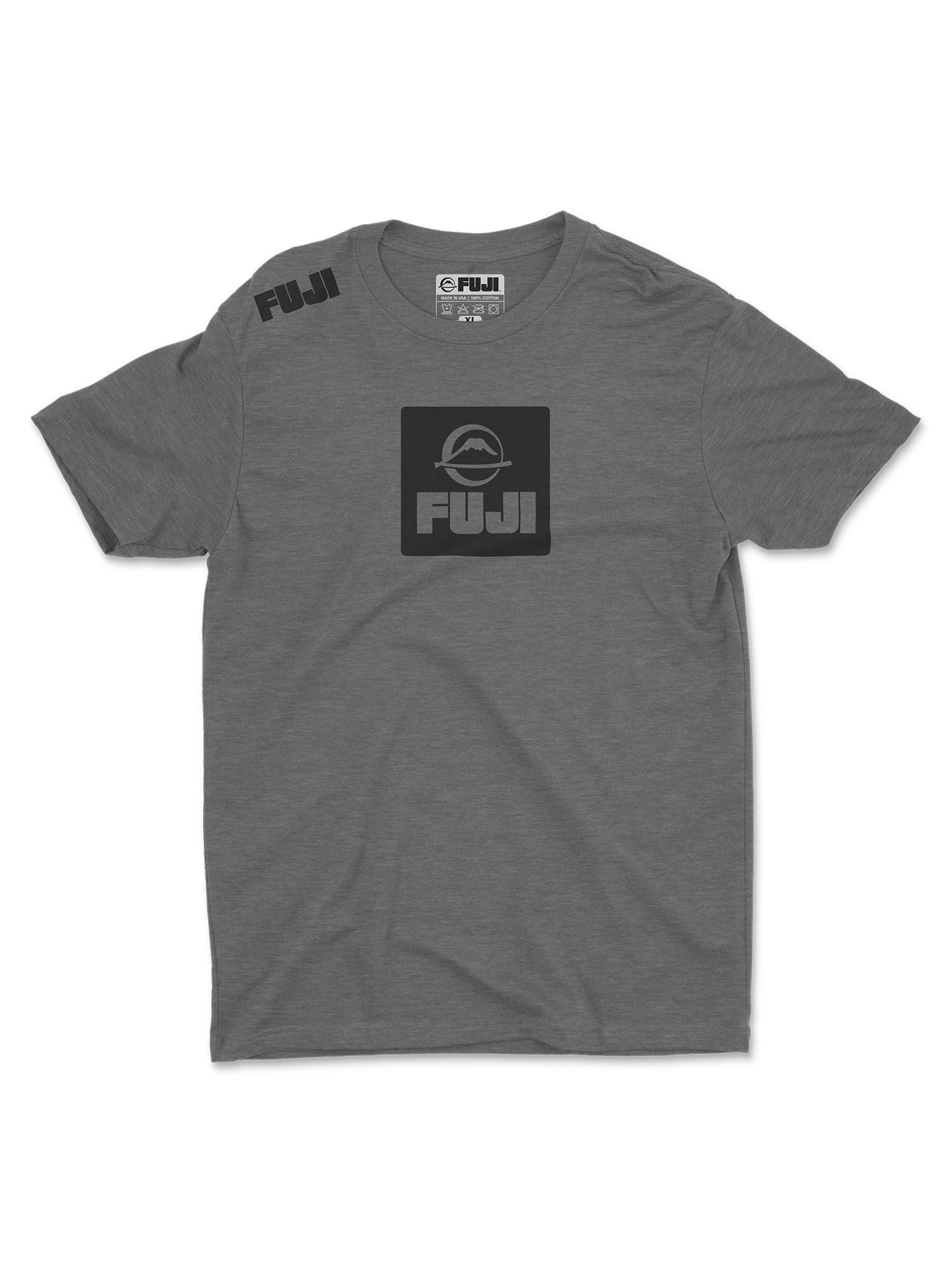 The Elevate Your Journey Shirt Heather Grey features short sleeves, a black square FUJI logo and text across the chest, black FUJI text on the right shoulder, and a small circular graphic above the chest logo.