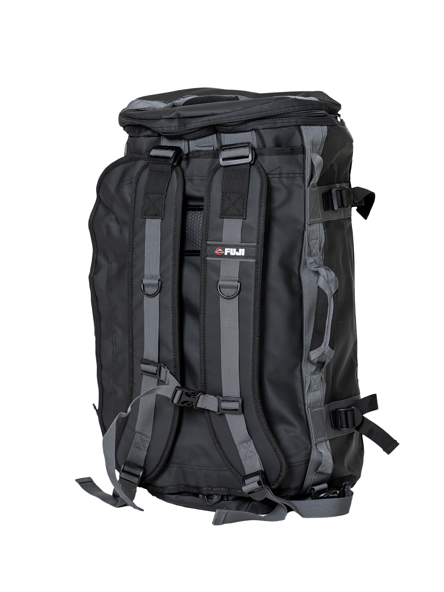 The Comp Duffle Black Grey is a large backpack with padded shoulder straps, multiple straps and buckles, and a top handle, shown upright on a white background.