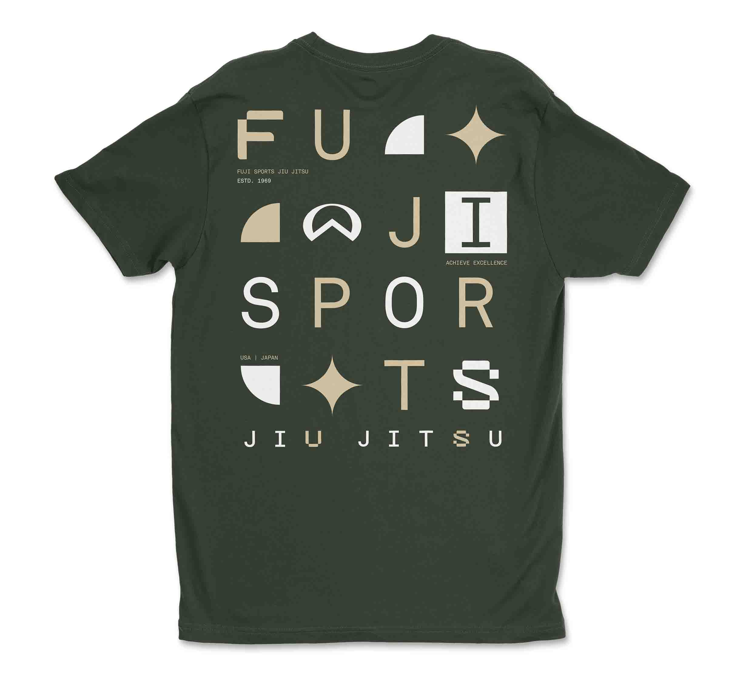 The Apex T-Shirt Forest Green features abstract shapes, stars, and bold white and tan “FUJI SPORTS JIU JITSU” lettering on the back, plus small “ACHIEVE EXCELLENCE” and “USA / JAPAN” text.
