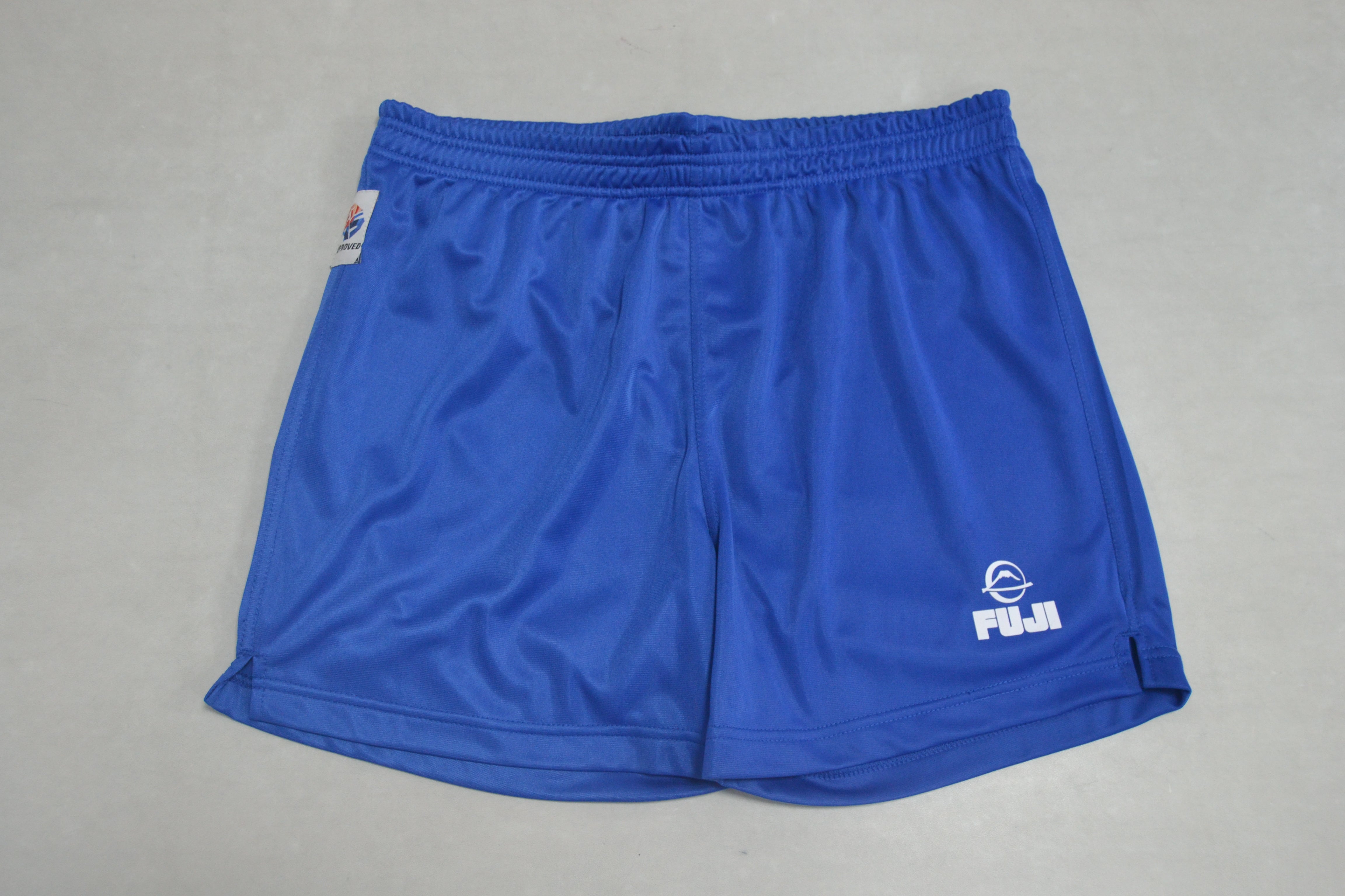 A pair of FIAS Sambo Shorts Blue with an elastic waistband, featuring a small white FUJI logo on the right leg and a subtle white brand tag on the left hip, displayed against a light gray background.