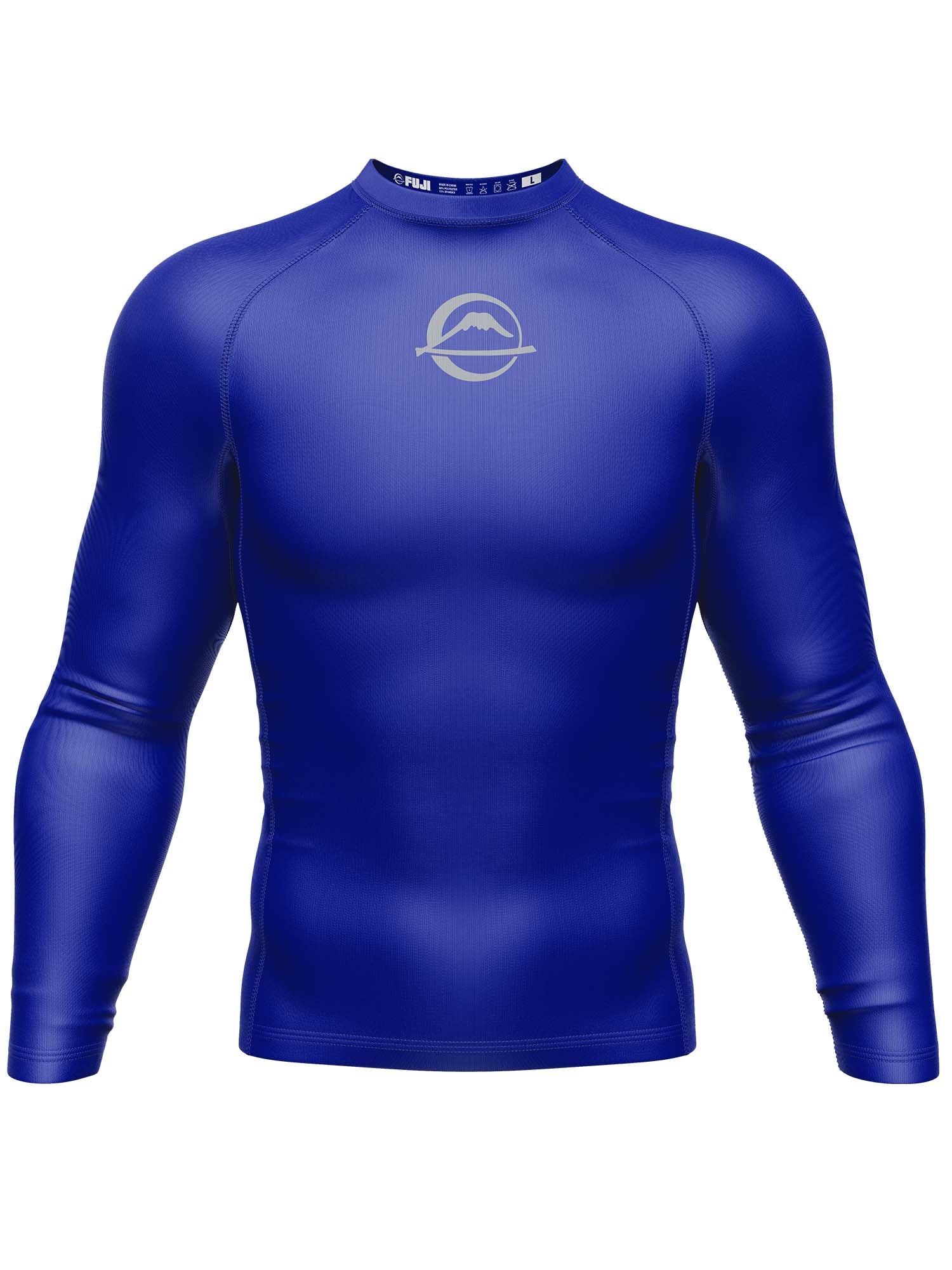 The Baseline Ranked Long Sleeve Rashguard Blue is a form-fitting, blue athletic shirt with long sleeves, a crew neck, and a white minimalist wave logo on the chest, shown on an invisible mannequin against a white background.
