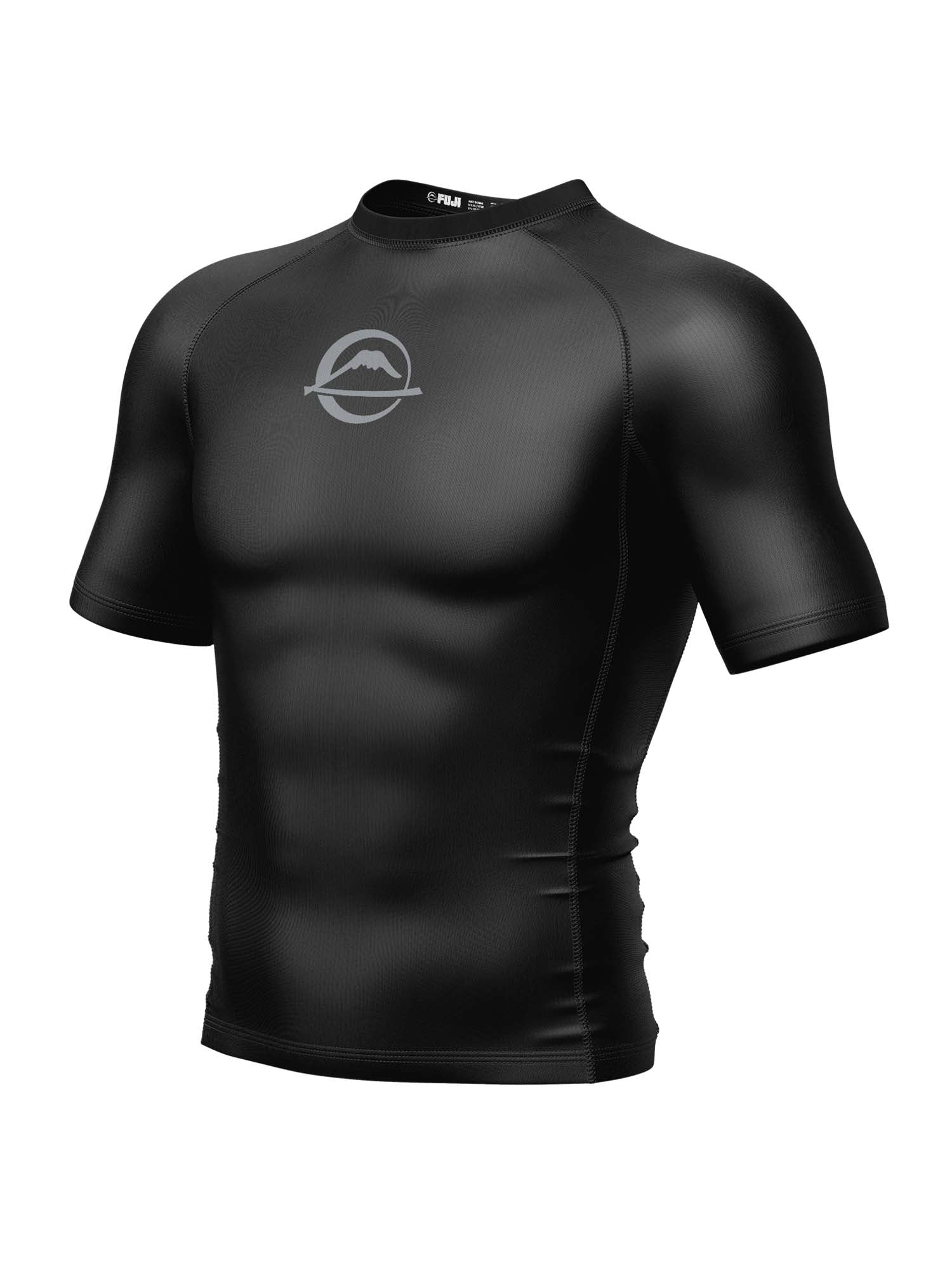 The Baseline Ranked Short Sleeve Rashguard Black is a form-fitting, black athletic shirt featuring a subtle mountain-and-circle logo on the chest, shown on a plain white background.
