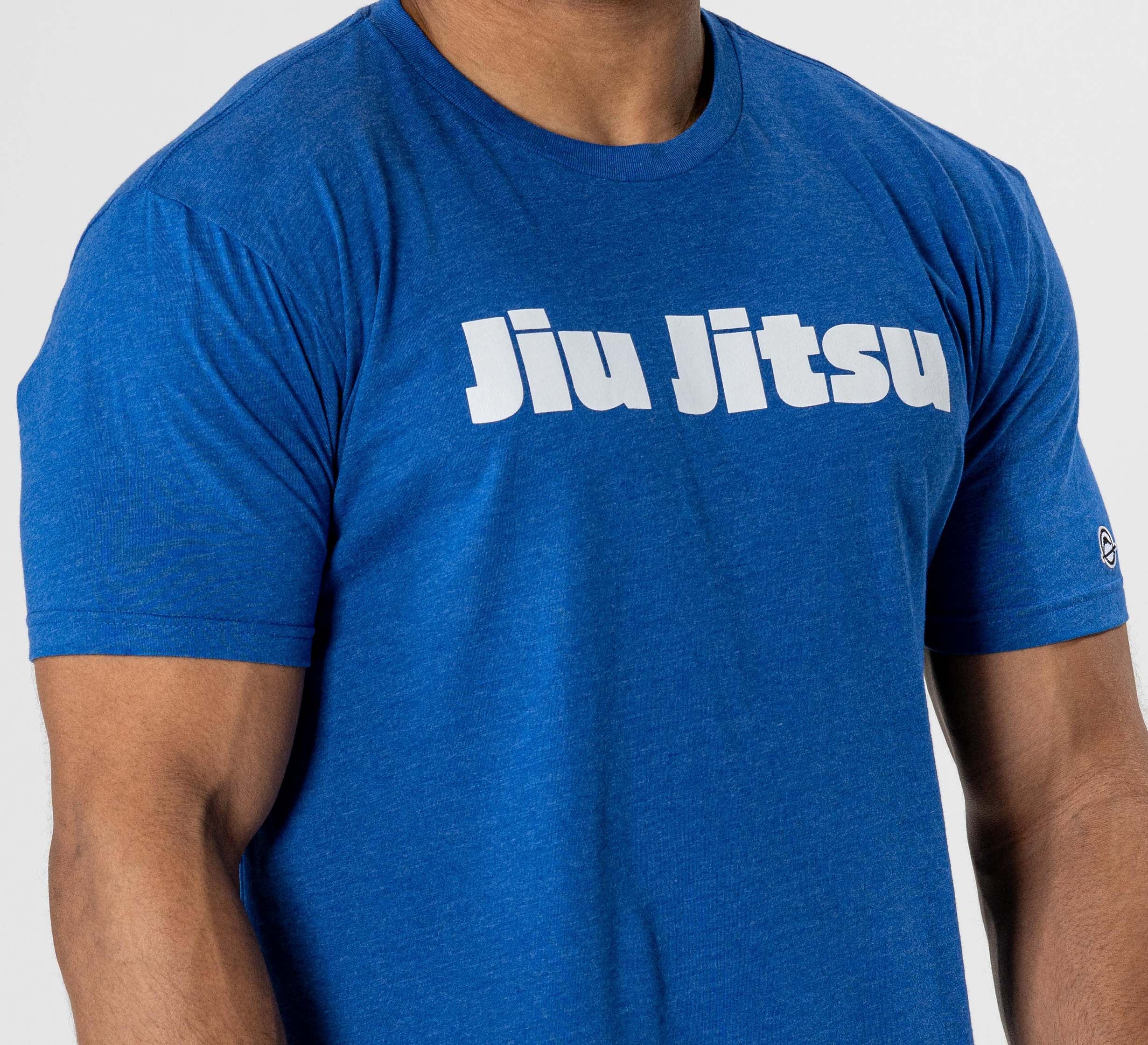 A man wearing a Jiu Jitsu Player T-Shirt in blue.