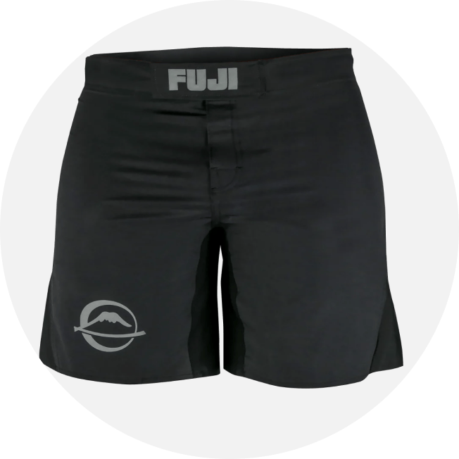 A pair of black athletic shorts with the word FUJI on the waistband and a circular mountain logo on the left leg. The shorts have short side slits for movement.