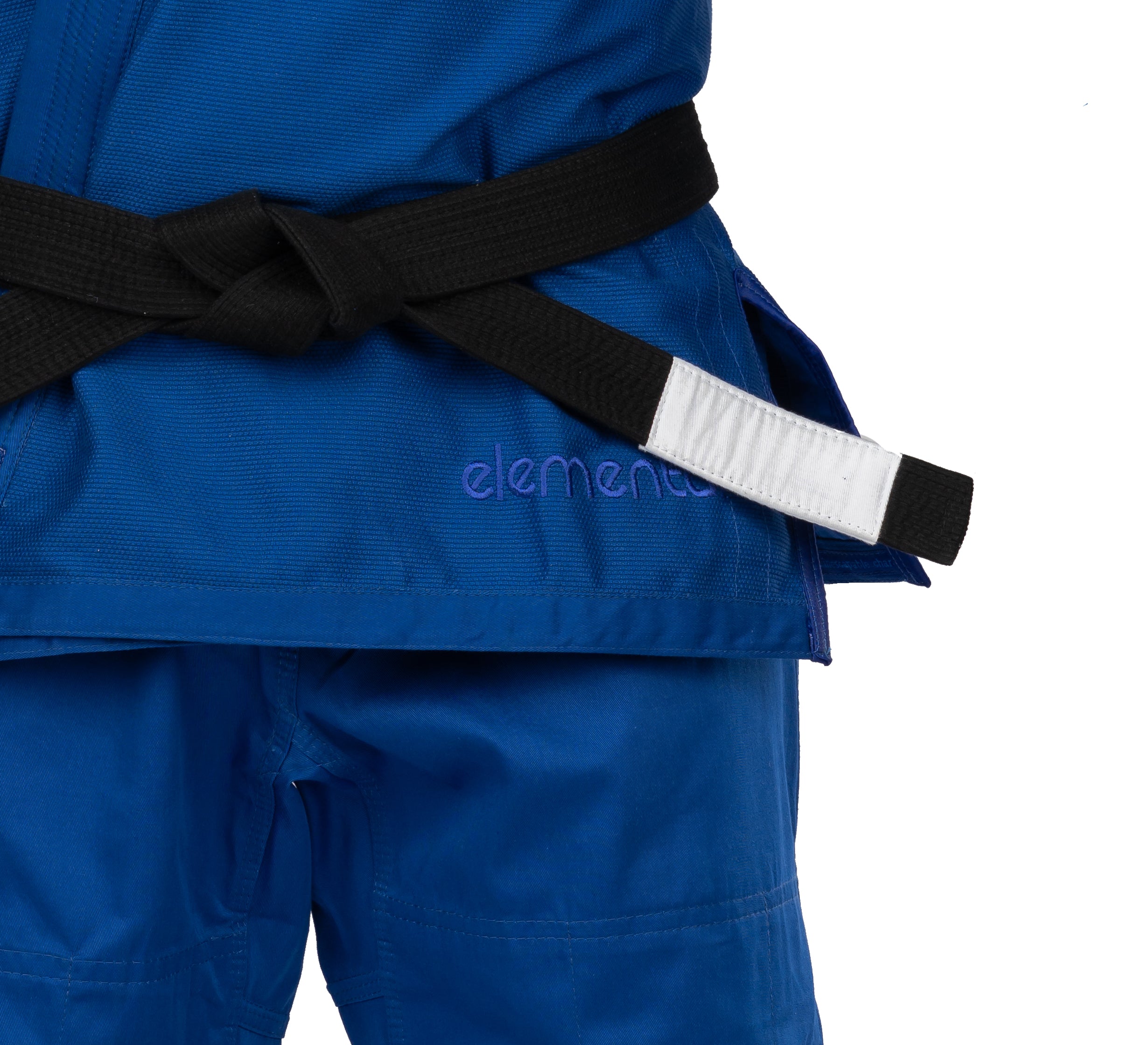 A person is wearing the Elemental BJJ Gi Blue with a black belt featuring a white stripe on one end, tied at the waist. Only their upper body and legs are shown; their face is not visible.