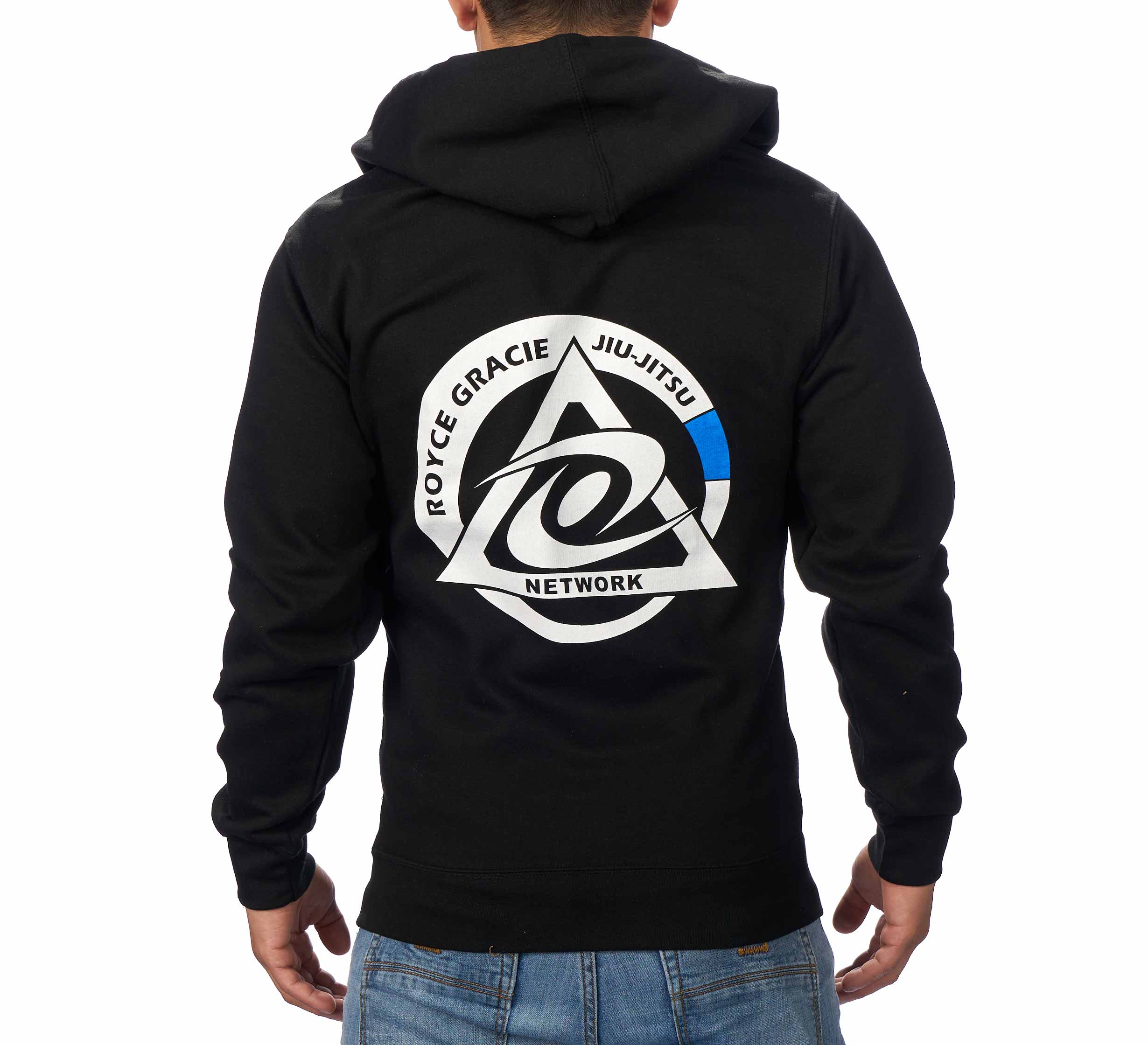 A person wearing the Royce Gracie Collegiate Black Zip Up Hoodie, which has a large back logo with a triangle and circular design in white, black, and blue.