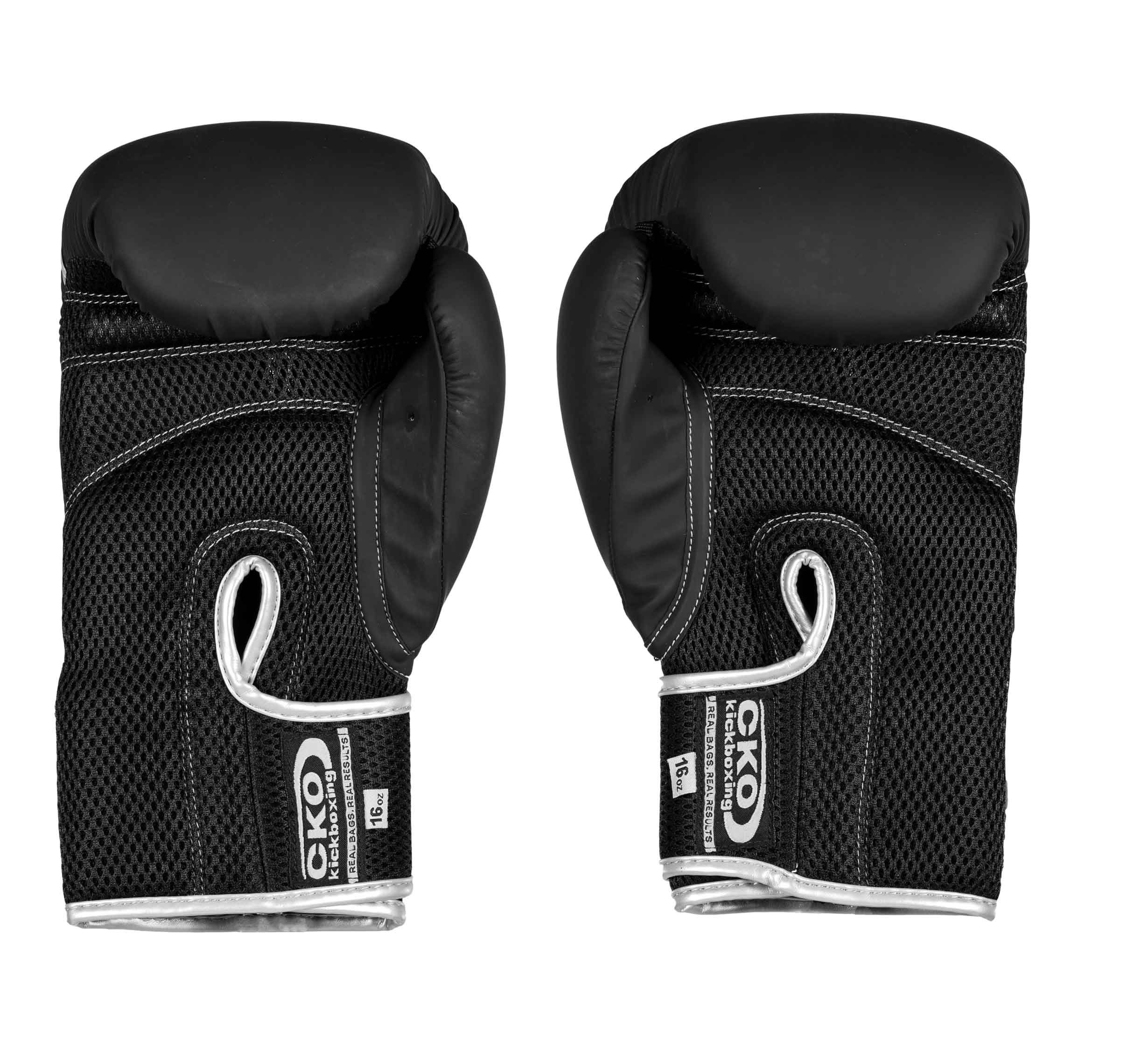 A pair of CKO Baseline Gloves Black featuring mesh fabric and white trim, positioned upright side by side, displaying palms and wrist straps with visible brand logos.