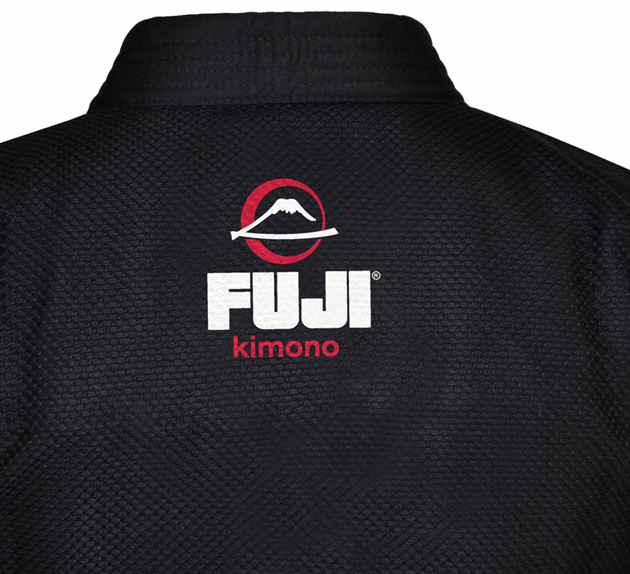 Close-up of the back of the black All Around Kids BJJ Gi, featuring a textured design with "FUJI" and a red and white mountain logo embroidered on it.