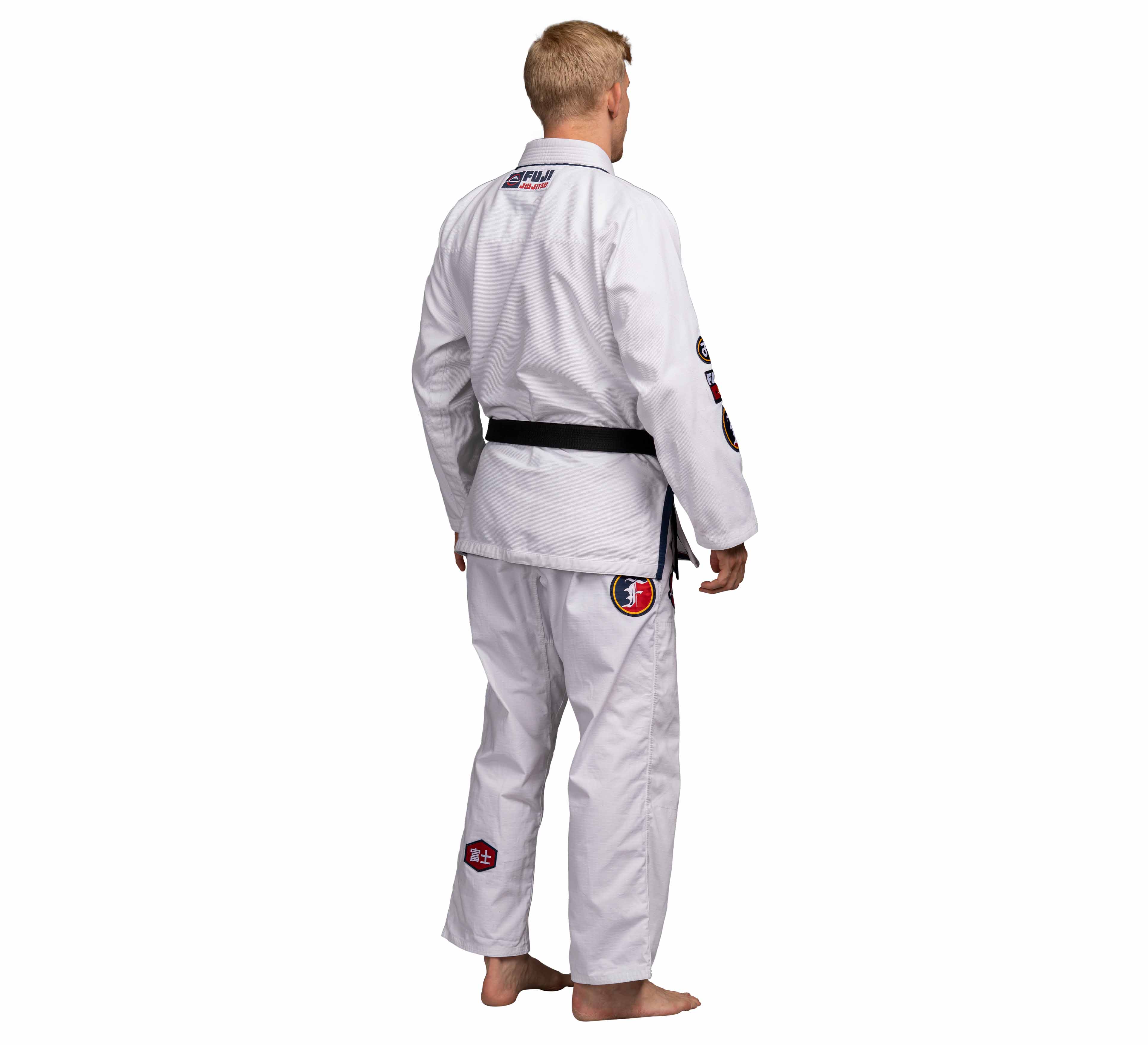 A man wearing the Suparaito BJJ Gi XTR Edition in white.