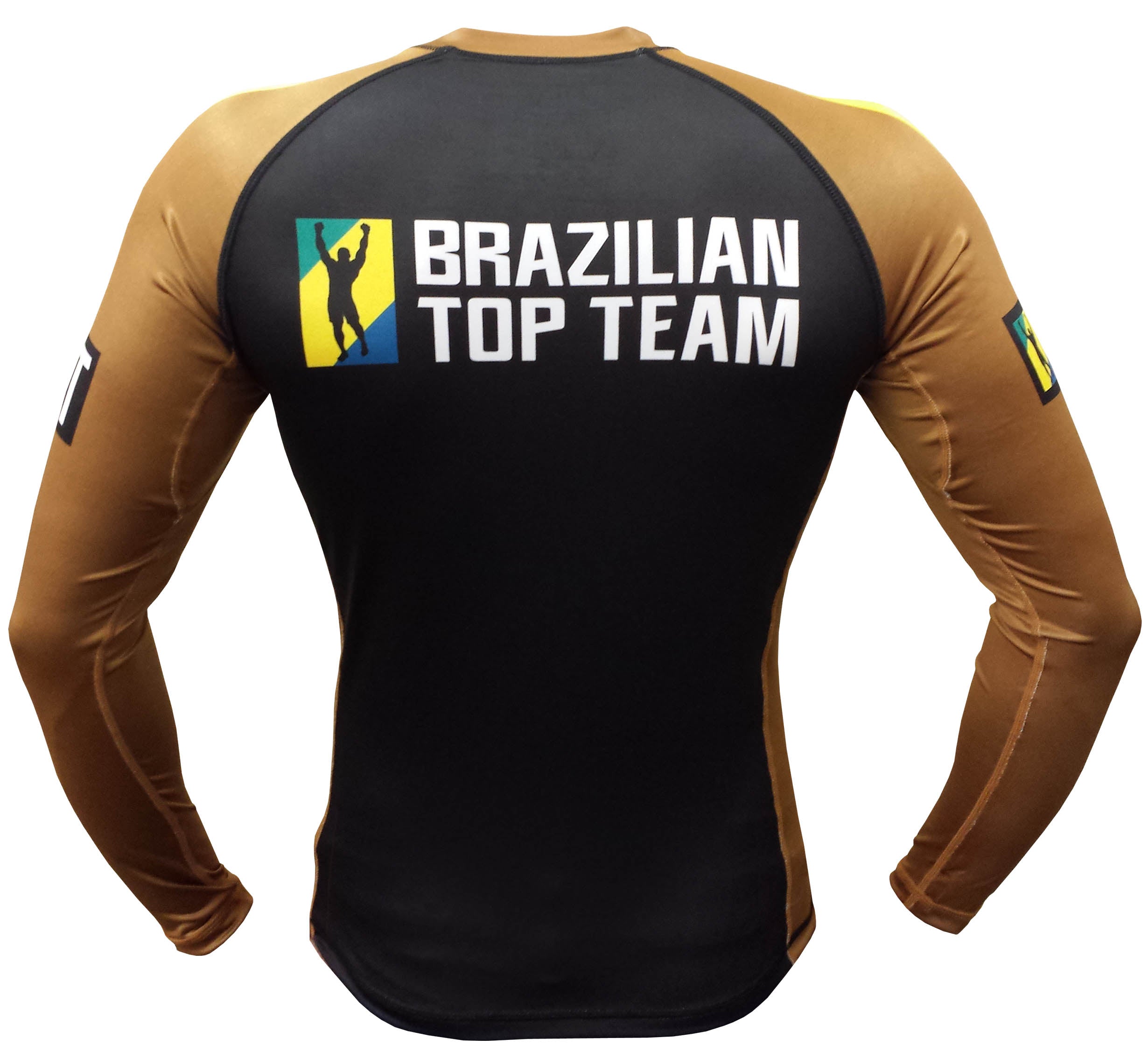 A woman wears a black and brown BTT Ranked Long Sleeve Womens Rashguard featuring BRAZILIAN TOP TEAM and a yellow, blue, and black logo on the back.