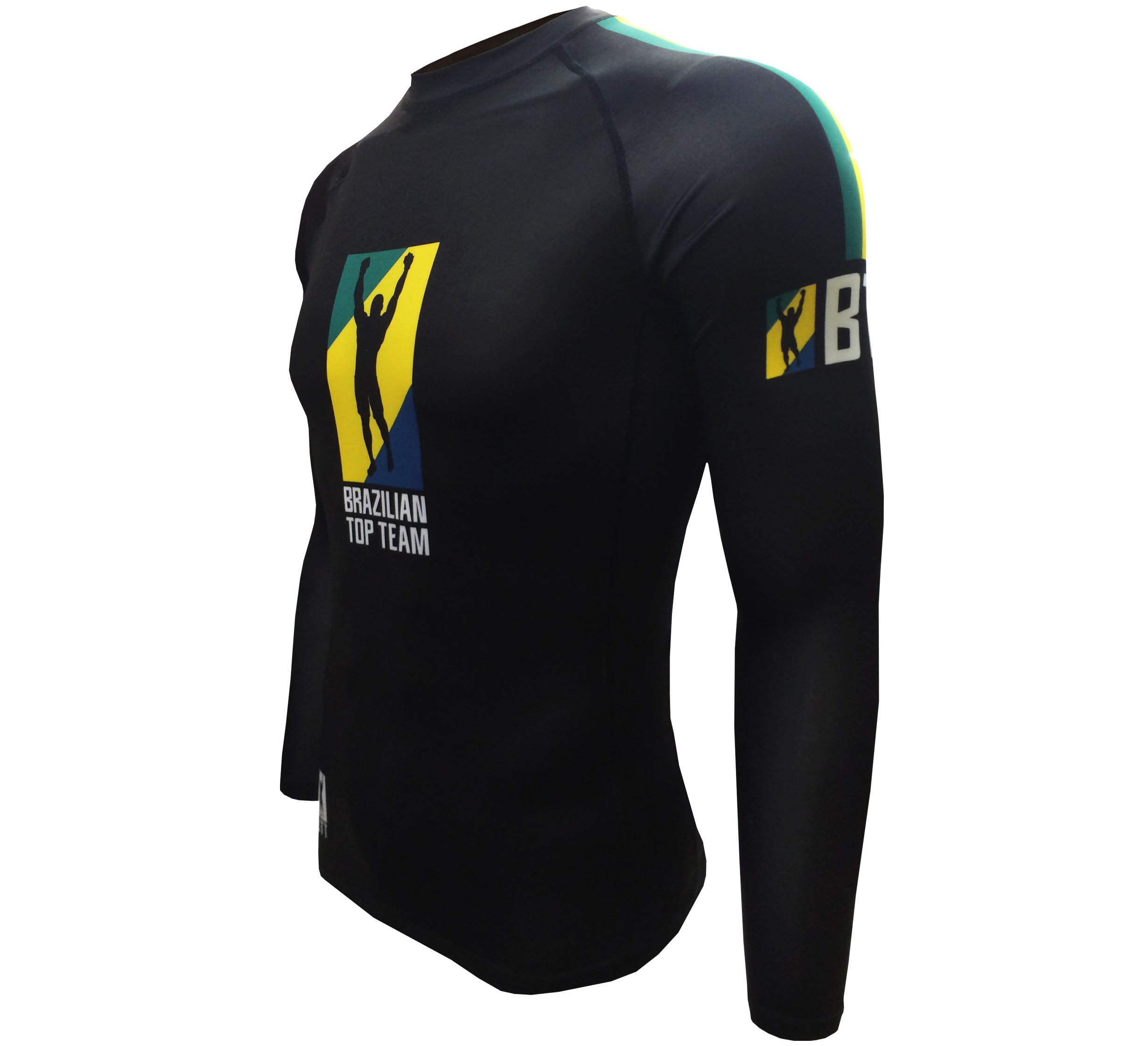 The BTT Ranked Long Sleeve Women's Rashguard is black with the Brazilian Top Team logo on the chest and left sleeve, featuring a stylized figure raising their arms inside a yellow and green rectangle.