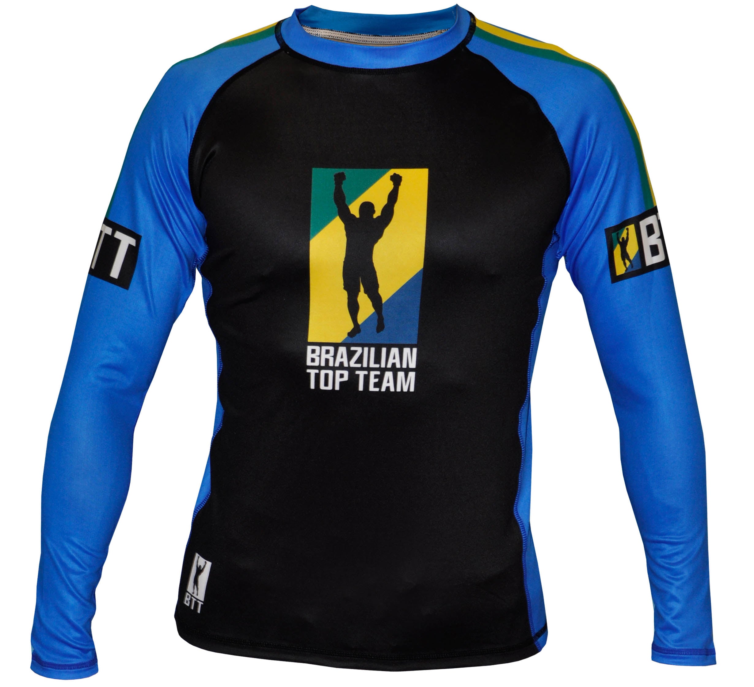 The BTT Ranked Long Sleeve Womens Rashguard features blue sleeves, a black torso, and the Brazilian Top Team logo—a silhouette with raised arms over a yellow and blue background—printed on the chest.