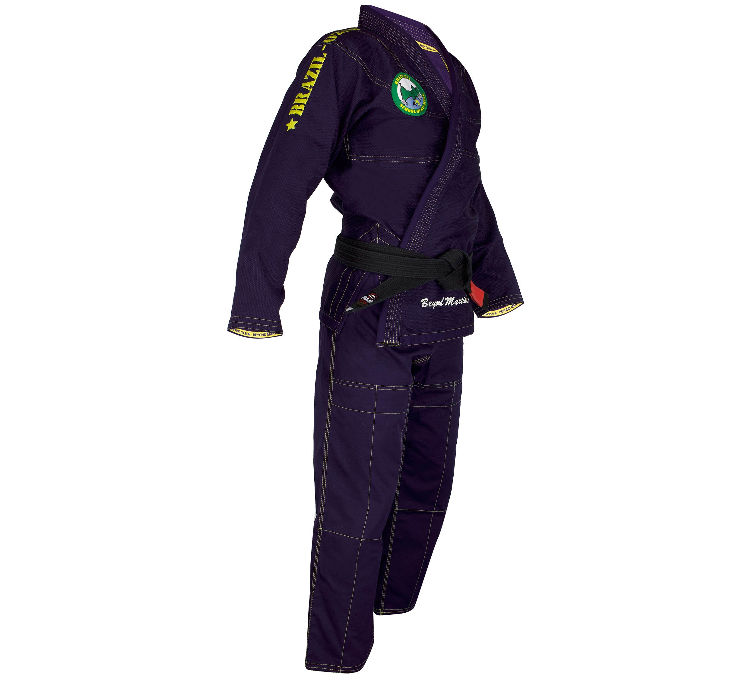 The Brazil 021 Competition Gi is a dark purple Brazilian Jiu-Jitsu uniform with yellow stitching, patches, and lettering, displayed on a mannequin. The set includes a jacket, pants, and features a black belt tied at the waist.