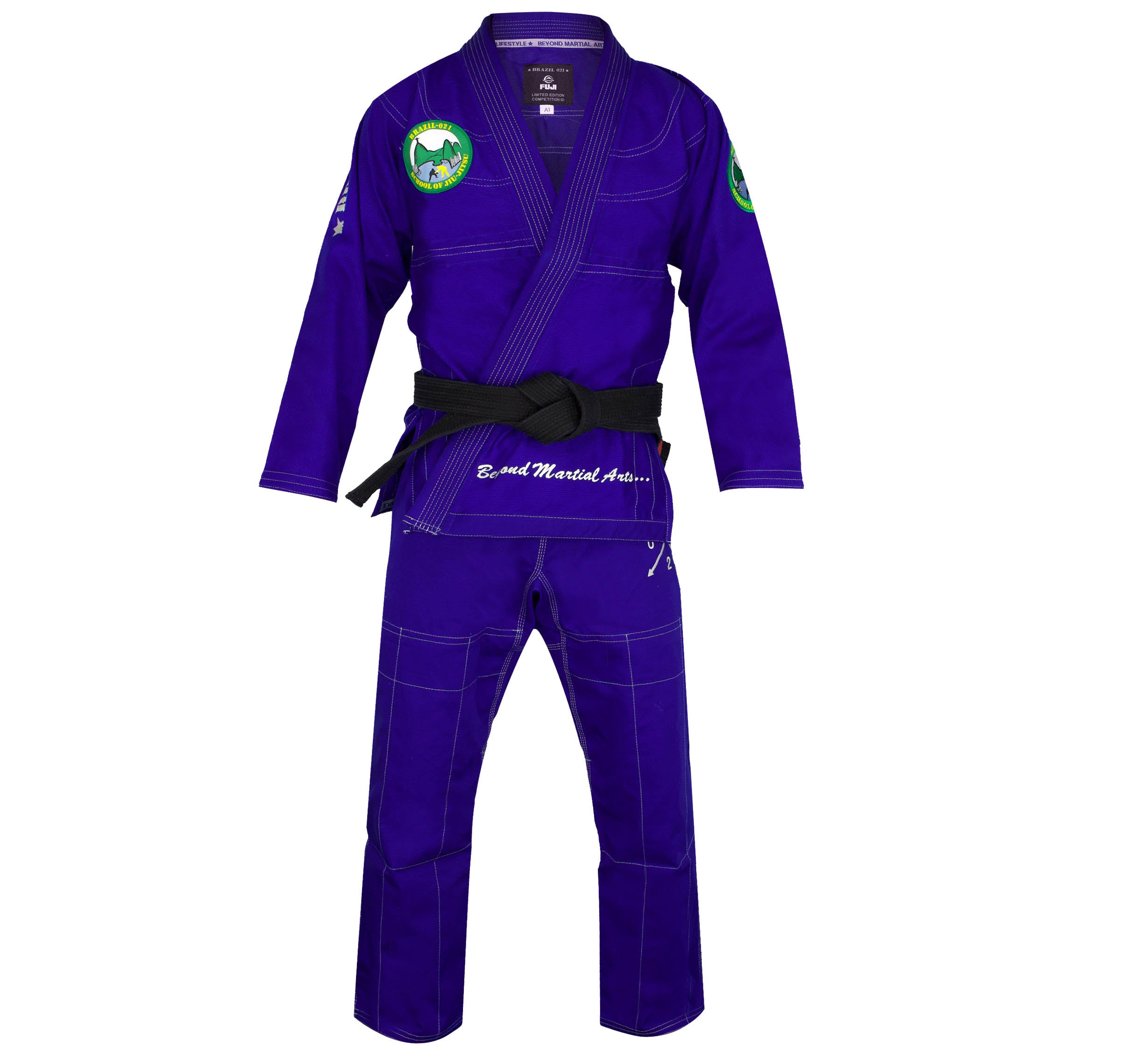 The Brazil 021 Competition Gi is a royal blue BJJ set with a black belt, white stitching, green circular patches on the right sleeve and left chest, and "BJJ" and "Martial Arts" text above the left knee.