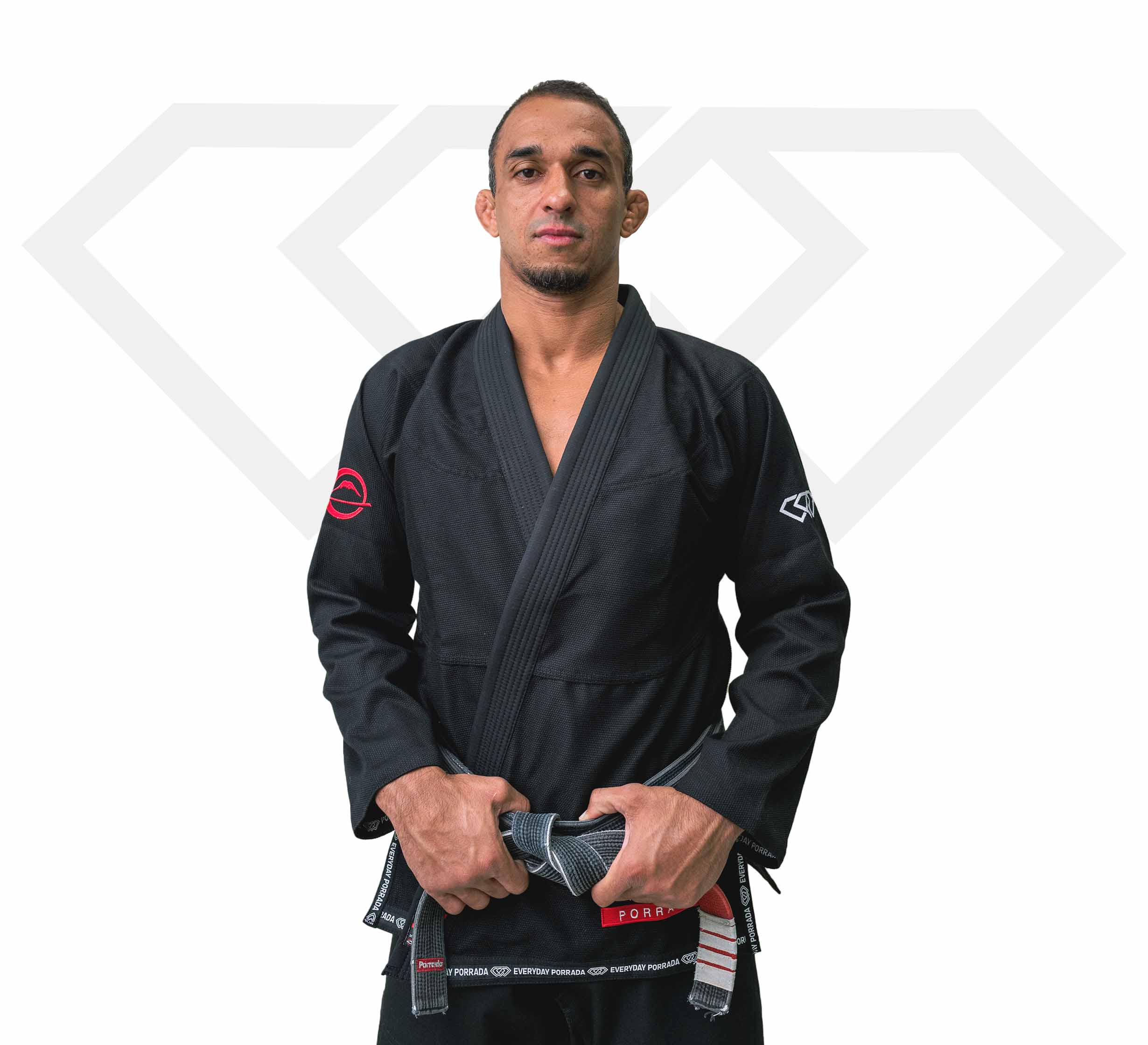 A confident man wearing the Everyday Porrada Flow-Tech BJJ Gi stands facing forward, holding a black belt with red bars, against a white background with a faint geometric logo.