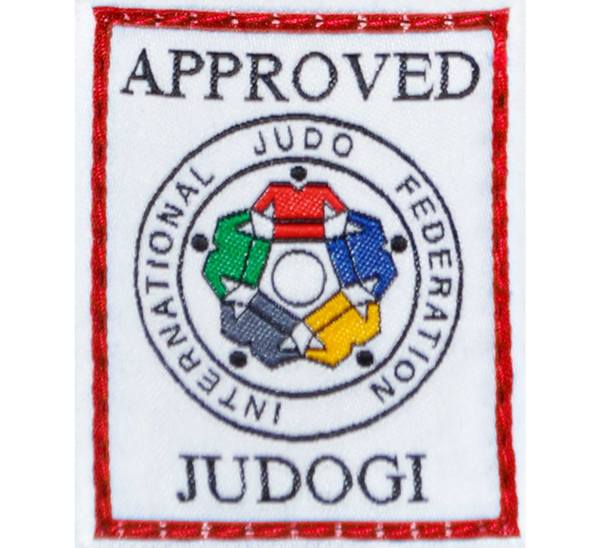 The Mizuno IJF Approved Japan Deluxe Black Belt features a patch with a red border that says "APPROVED JUDOGI" above and below the International Judo Federation logo, which is encircled by “INTERNATIONAL JUDO FEDERATION.”.