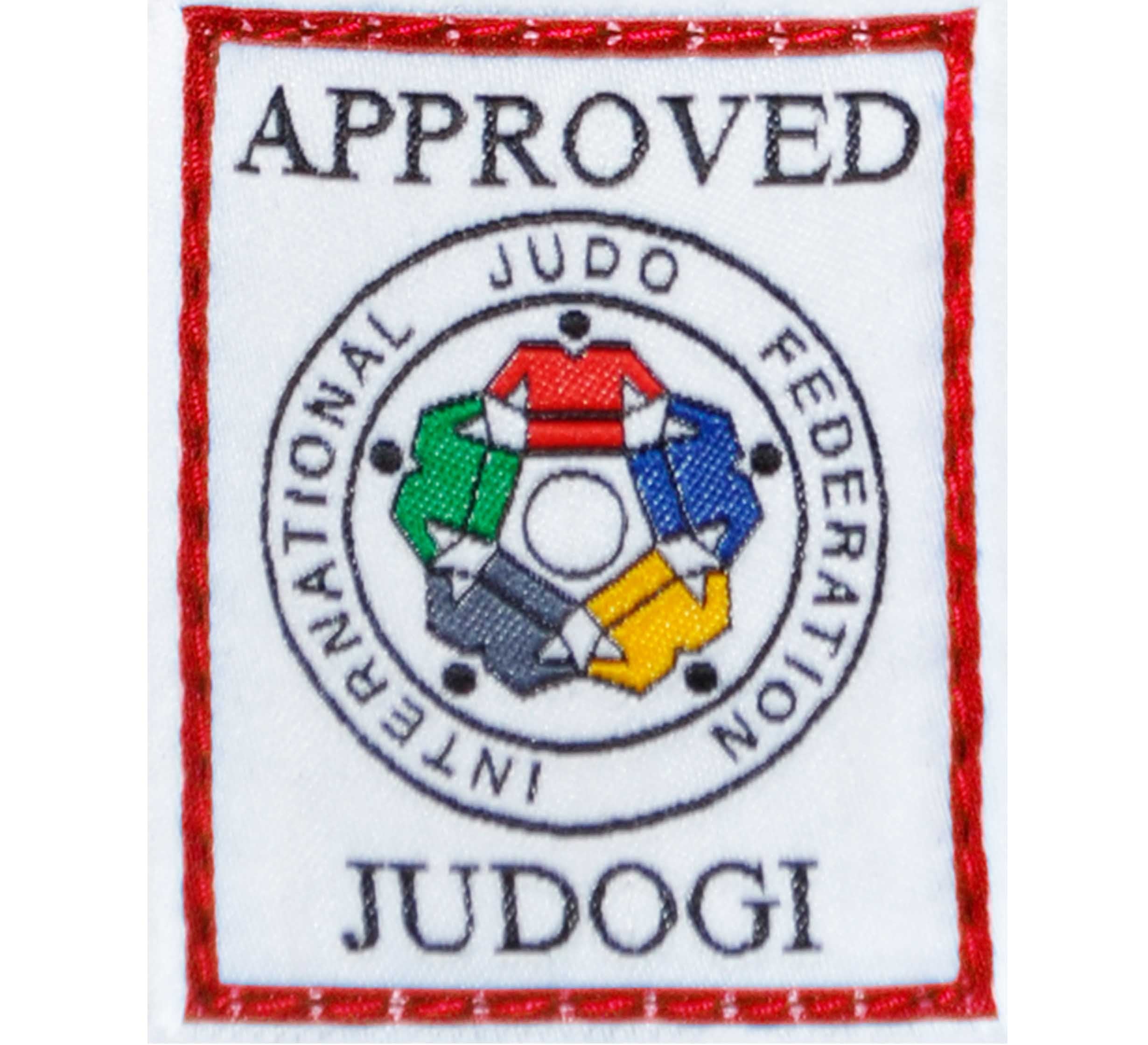 A white patch with a red border on the Mizuno IJF Approved Black Belt features "APPROVED JUDOGI" text and the International Judo Federation logo with interlocking blue, green, yellow, red, black, and grey shapes.