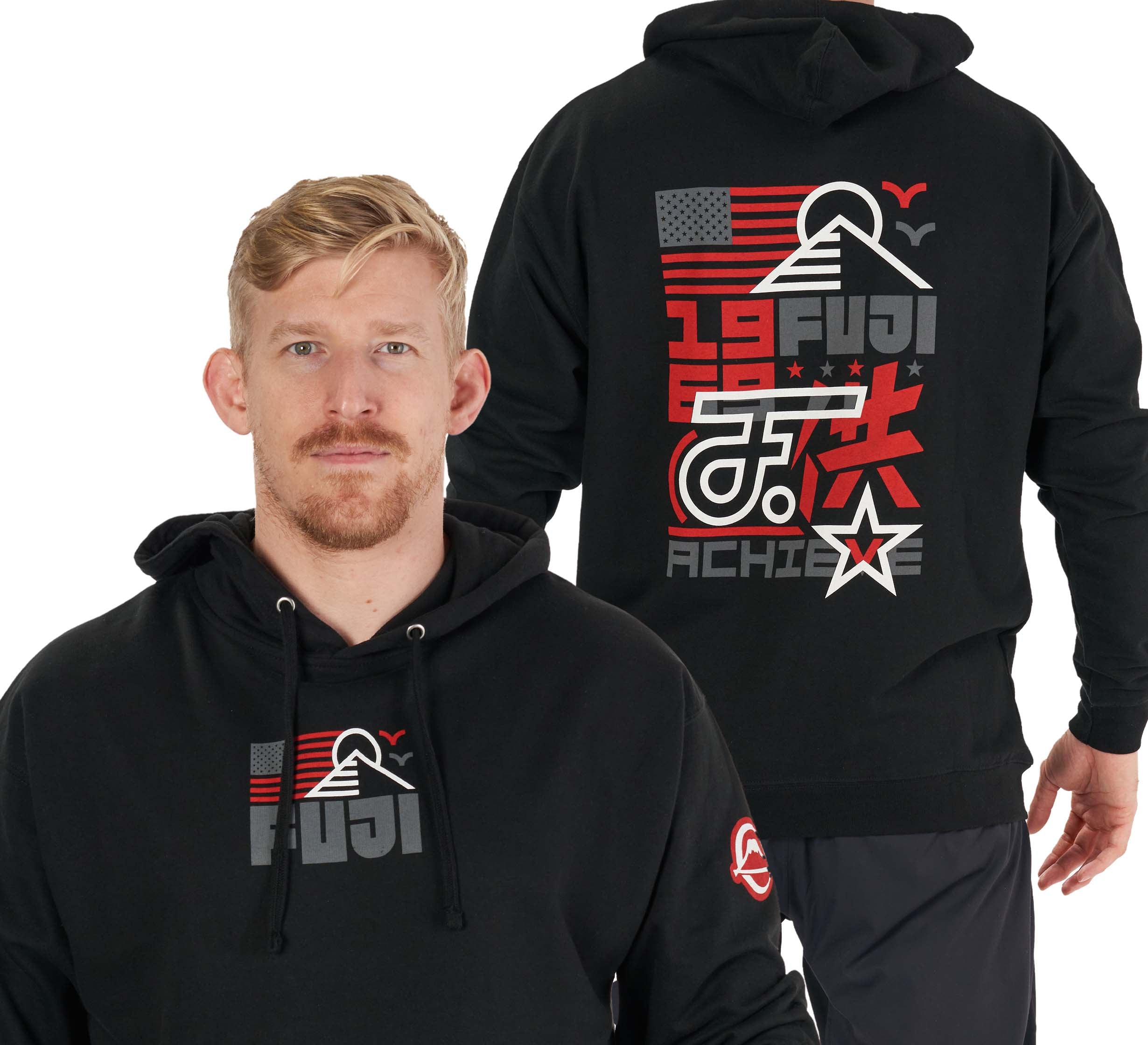 A man wears the Achieve Hoodie Black, featuring a red, white, and gray FUJI mountain graphic with the US flag, Japanese characters, and "ACHIEVE" on the back; a small logo appears on the front.