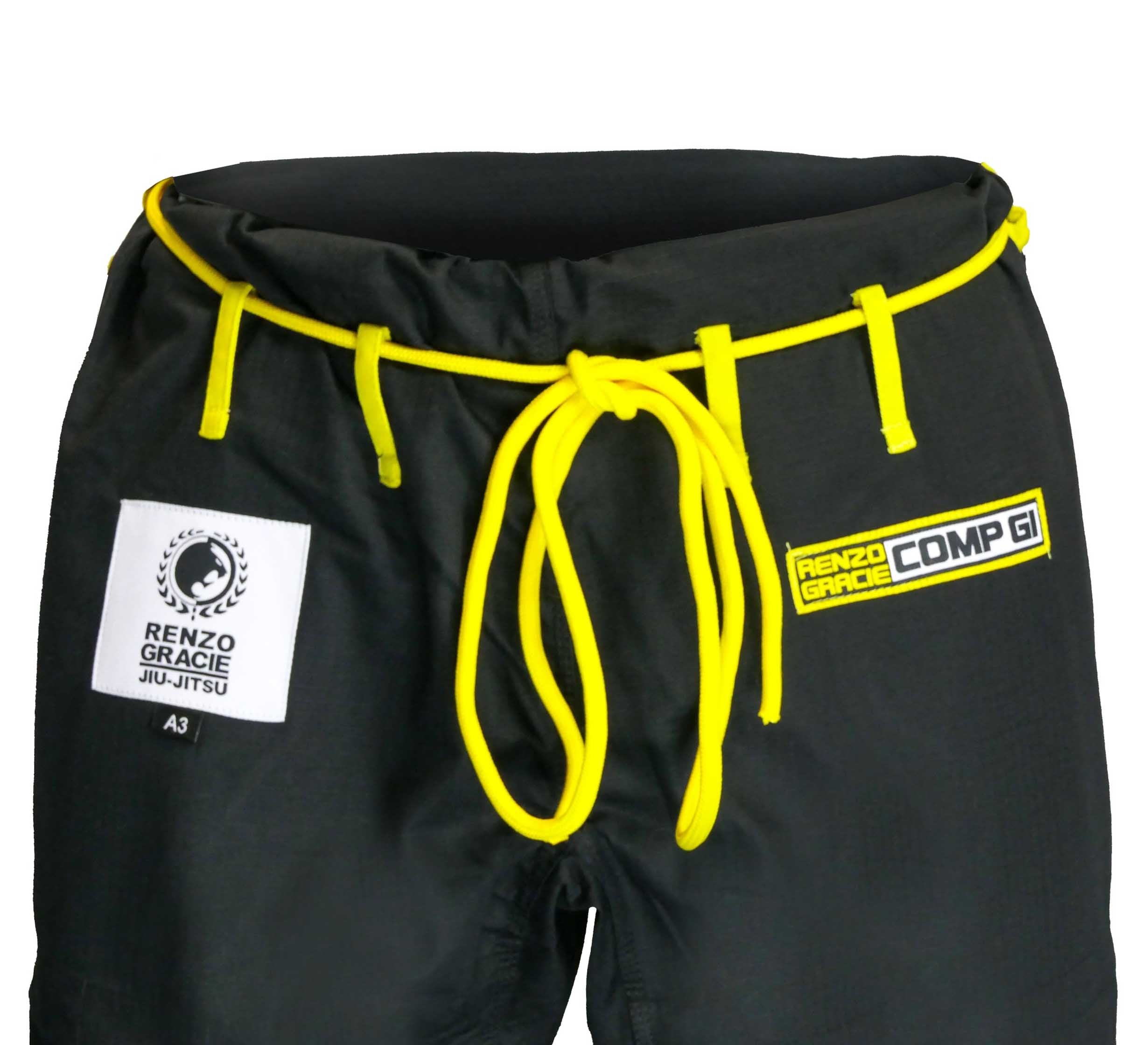 The Renzo Gracie Superlite Gi shorts are black with yellow drawstrings, featuring a Renzo Gracie Jiu-Jitsu patch on the left and a Renzo Gracie COMP GI patch on the right.
