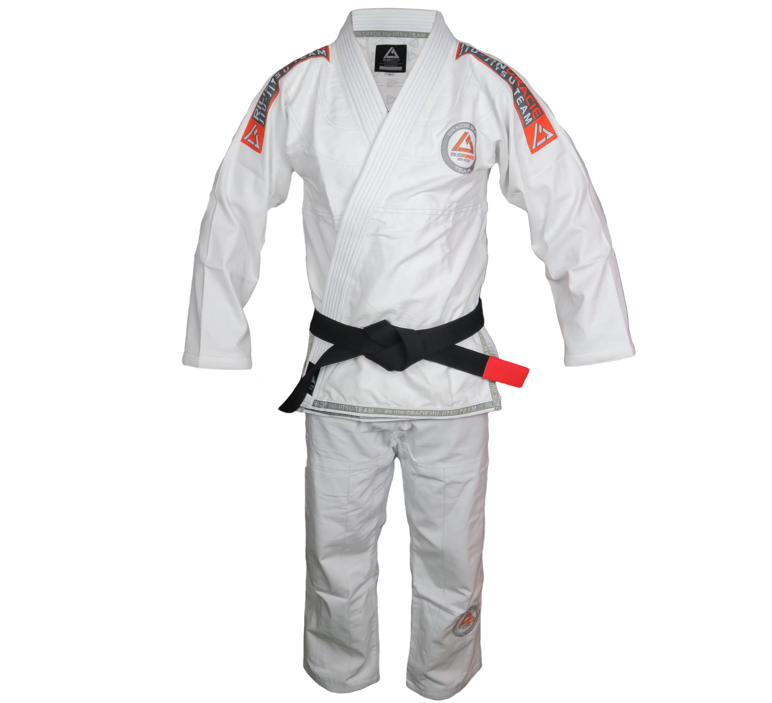 The Rilion Gracie Superlite Gi, shown in white with a black belt on a mannequin, features red and gray triangular logo patches on the shoulders and chest, and is made from textured fabric.