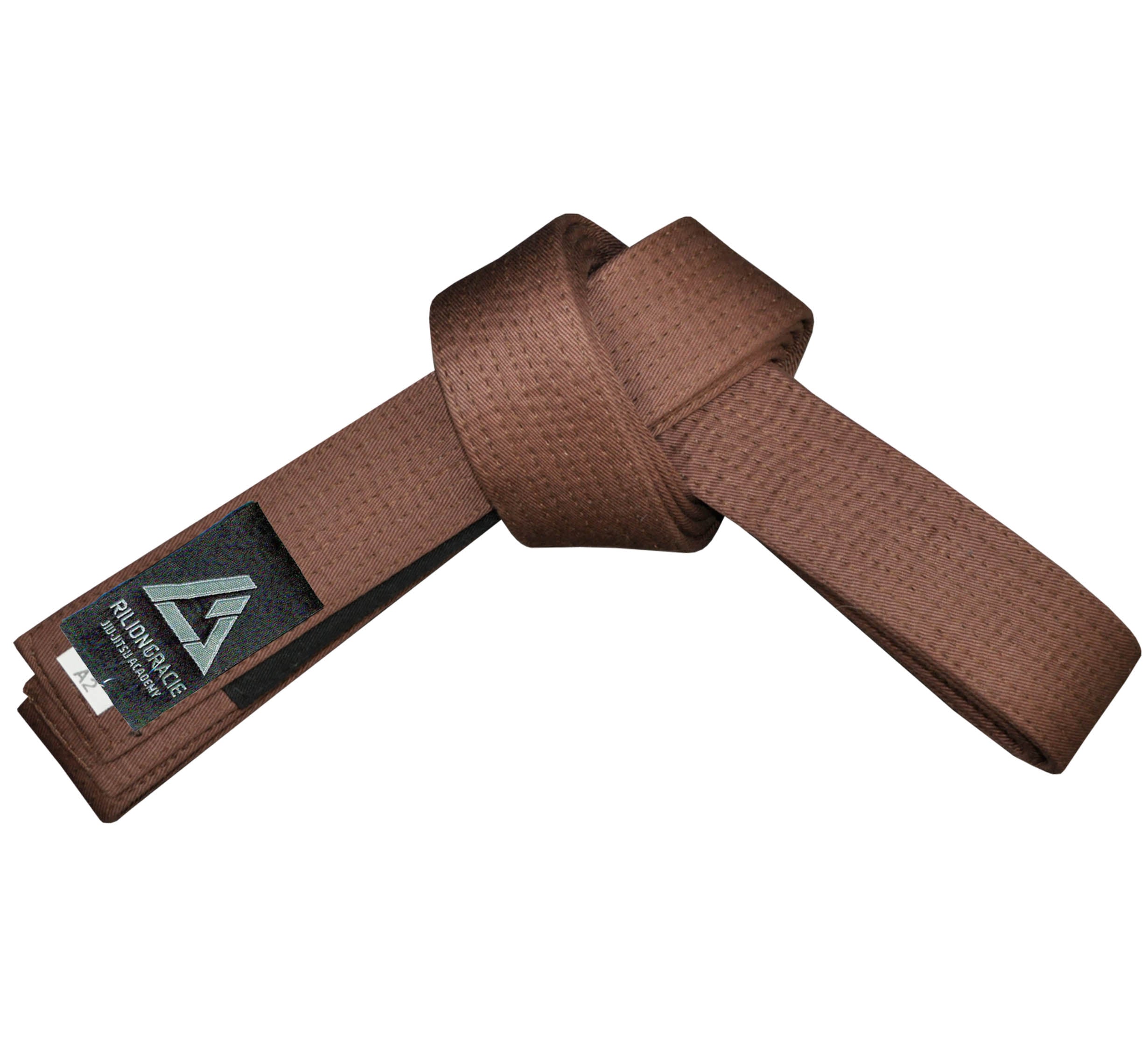 A neatly folded Rilion Gracie Belt Brown with a black label featuring a white logo is displayed on a white background.