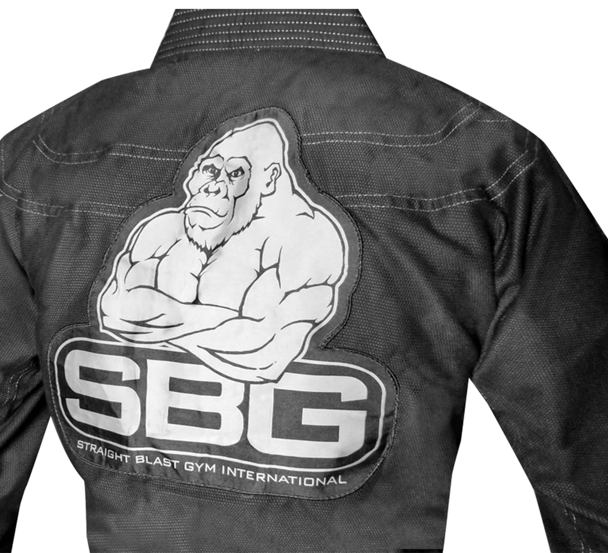 The SBG Super Lite Gi in black features a large back patch with a muscular gorilla, the SBG letters, and "Straight Blast Gym International" written underneath.
