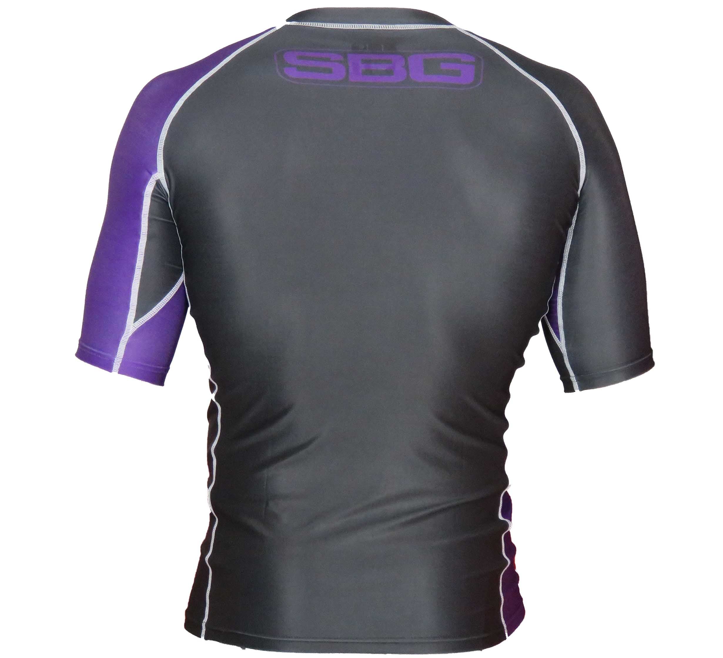 The SBG Short Sleeve Ranked Rashguard features black and purple compression fabric, white seam stitching, and large "SBG" lettering across the upper back, shown from the back view.