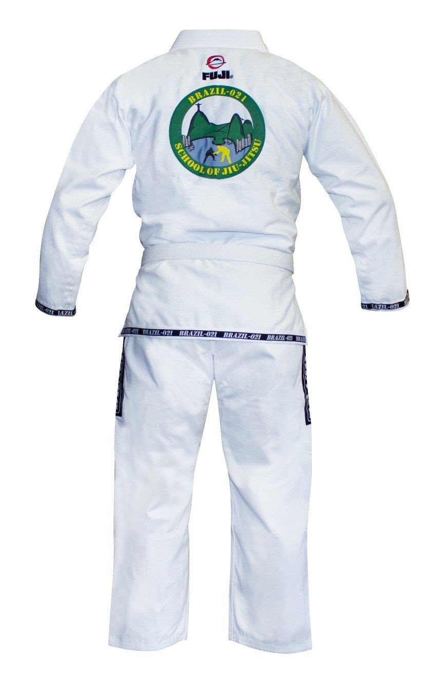 The BRAZIL 021 Adult BJJ Gi is shown from the back on a white background, featuring a large circular patch with "Brazil-021 School of Jiu-Jitsu" text and an illustration.