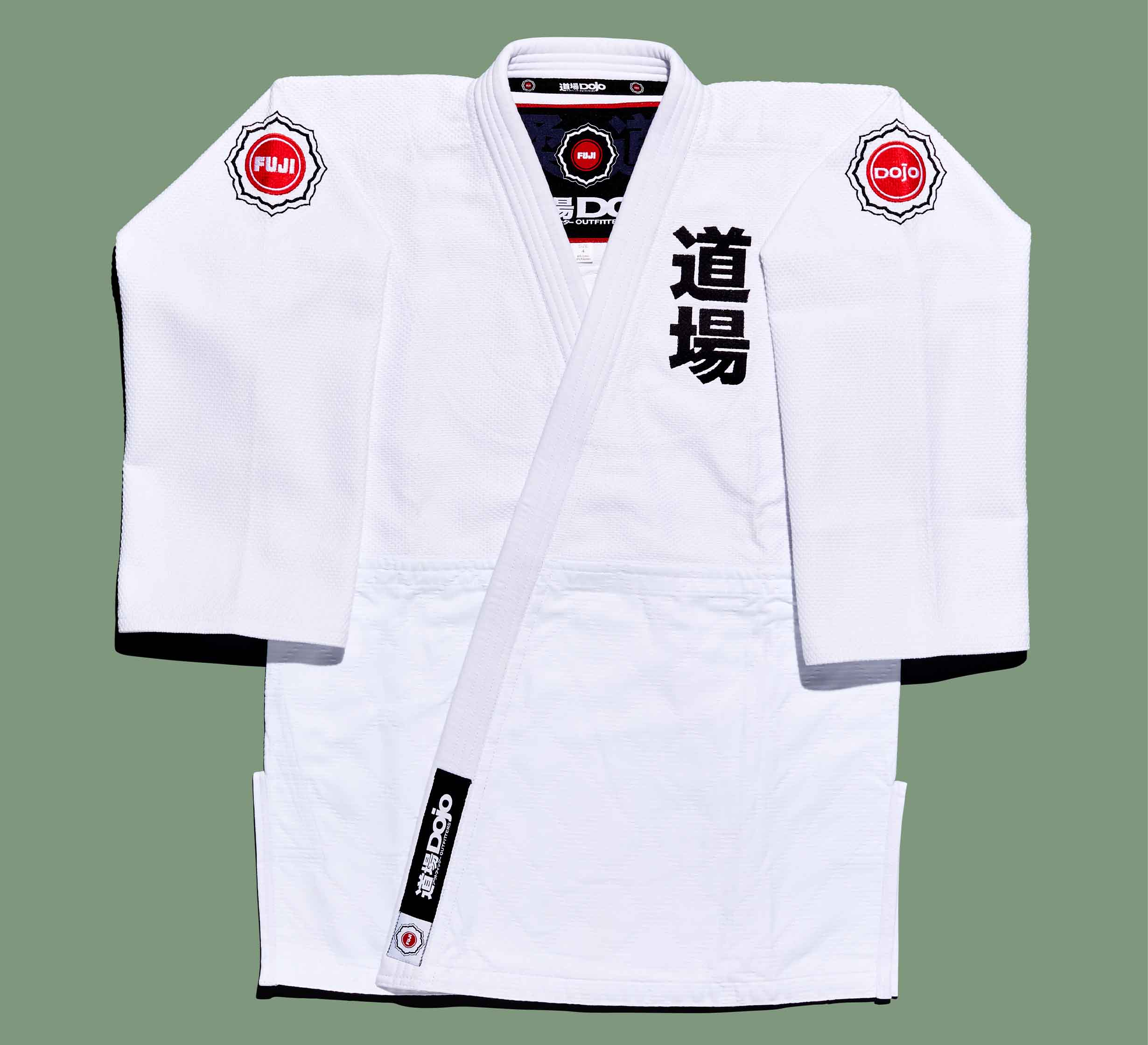 The Dojo Outfitters x FUJI Judo Gi is a white uniform featuring black and red patches.