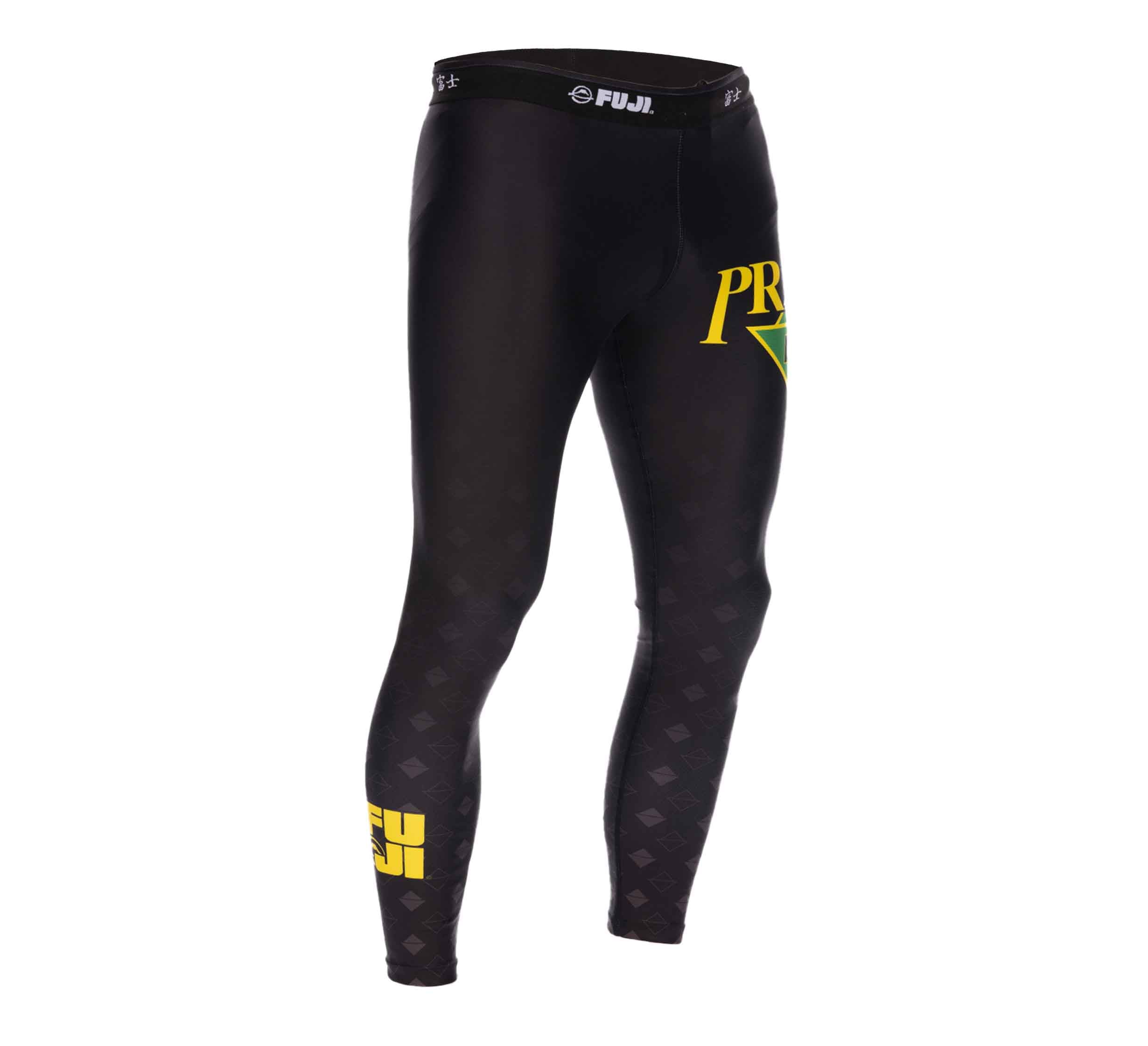 Premier Martial Arts Kids Spats in black, featuring a yellow FUJI logo on the waistband and lower left leg, plus yellow "PR" with a green triangle on the upper right leg. Shown on a white background.