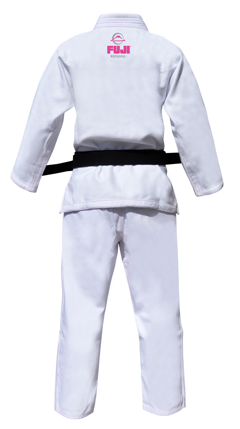 The Blossom Kids Jiu Jitsu Gi White is shown from the back with a black belt. The top features a pink FUJI logo and "kimono" below it. Background is plain white.
