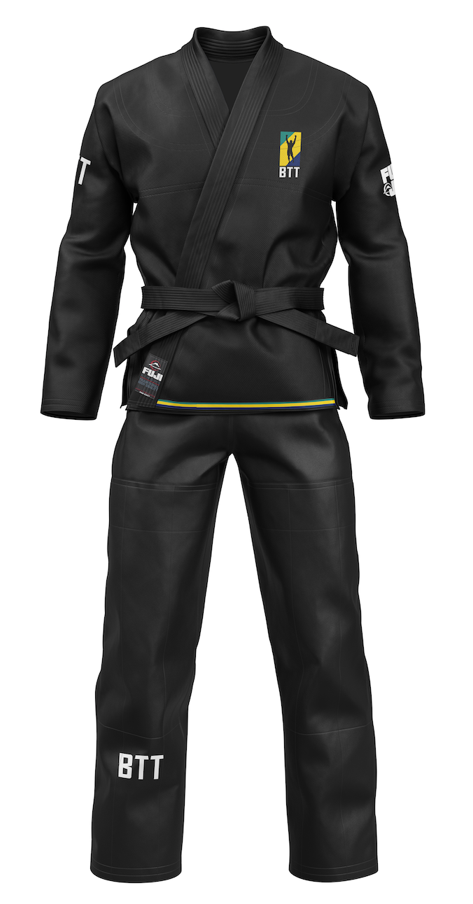 The BTT Standard Women's Gi in black, with a matching black belt, features the BTT logo and patches on the chest, sleeve, and pant leg. It is displayed on a white background.
