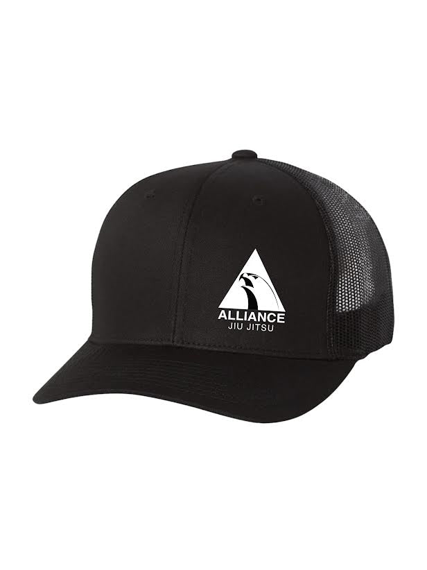 The Alliance Jiu Jitsu Trucker Hat Black features a black mesh design and displays a white triangle logo on the front that reads "Alliance Jiu Jitsu" with a stylized eagle silhouette.