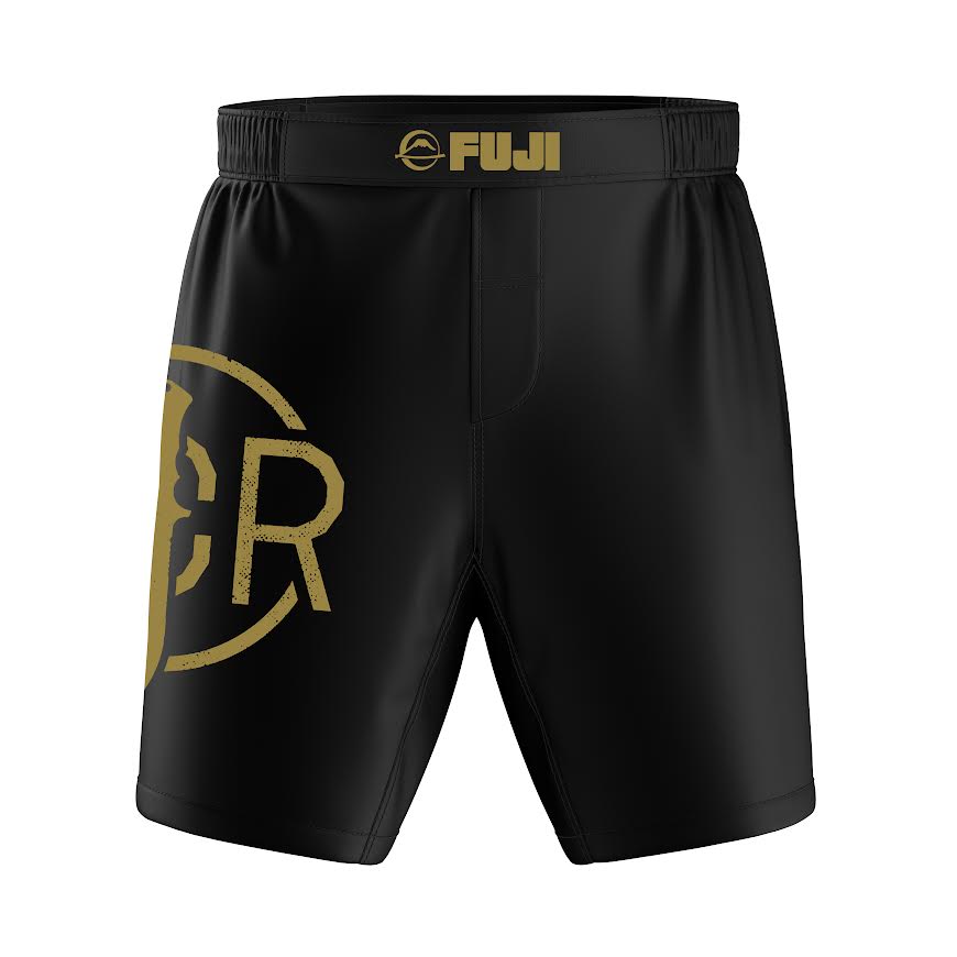 Sheepdog Response Essential Shorts Black featuring a gold FUJI logo on the waistband and a large partial gold CR design on the left leg, shown on a plain white background.