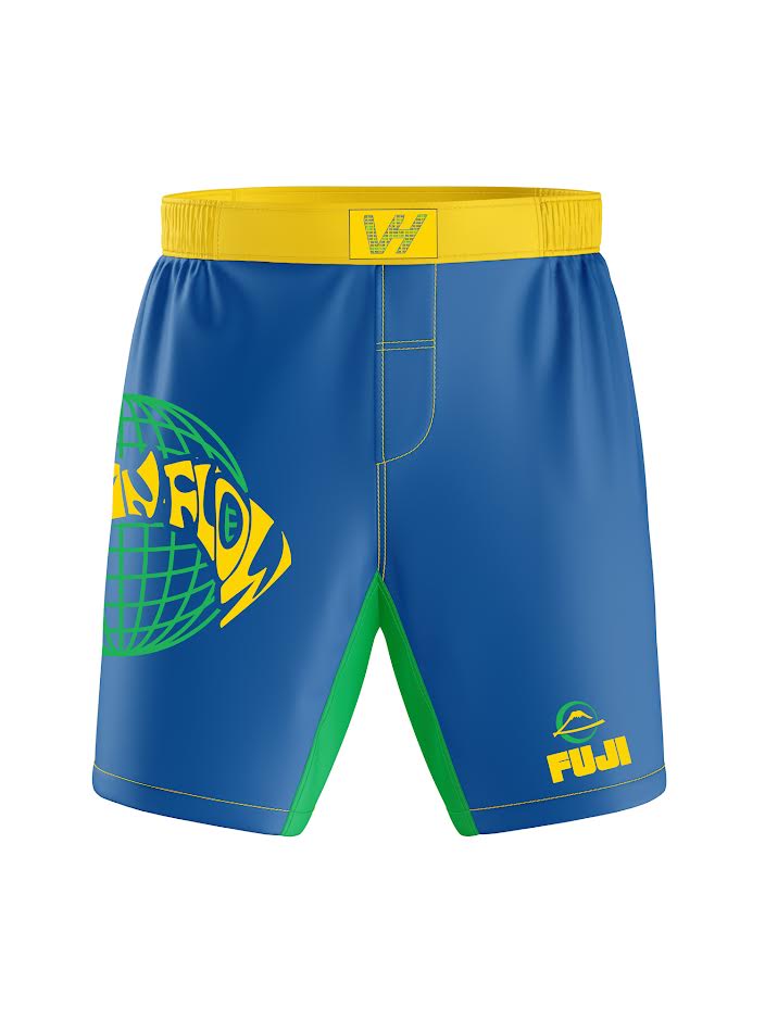 Big Man Flow Brazil Flex Lite Shorts in blue with a yellow waistband, a green crotch panel, and a large yellow and green globe graphic featuring the word FLOW on the side.
