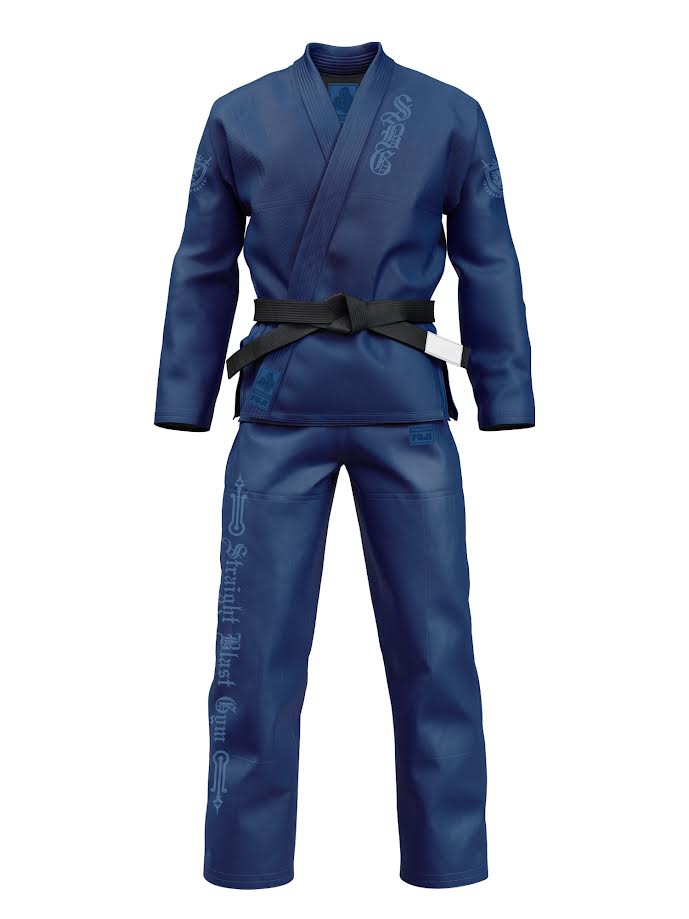 SBG Heraldry Suparaito BJJ GI Navy in navy blue with a black belt, featuring Straight Blast Gym text and crest graphics on the jacket and pants.