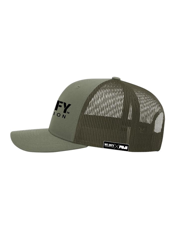 Sure! Here’s a revised sentence using the provided product data: The We Defy Trucker Hat Green features an olive green front with black mesh back, a flat bill, and bold black logos on the front and side—reading “WE DEFY” and “FUJI.”.