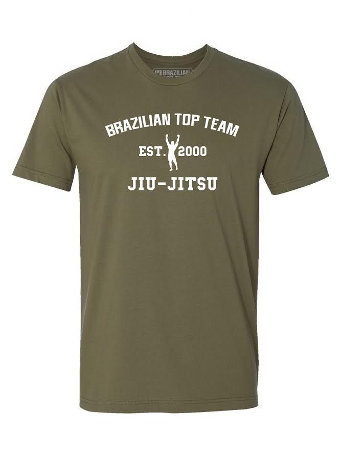 BTT Collegiate Army Green T-Shirt featuring white “Brazilian Top Team Est. 2000 Jiu-Jitsu” text and a small silhouette of a person raising their arms in the center.