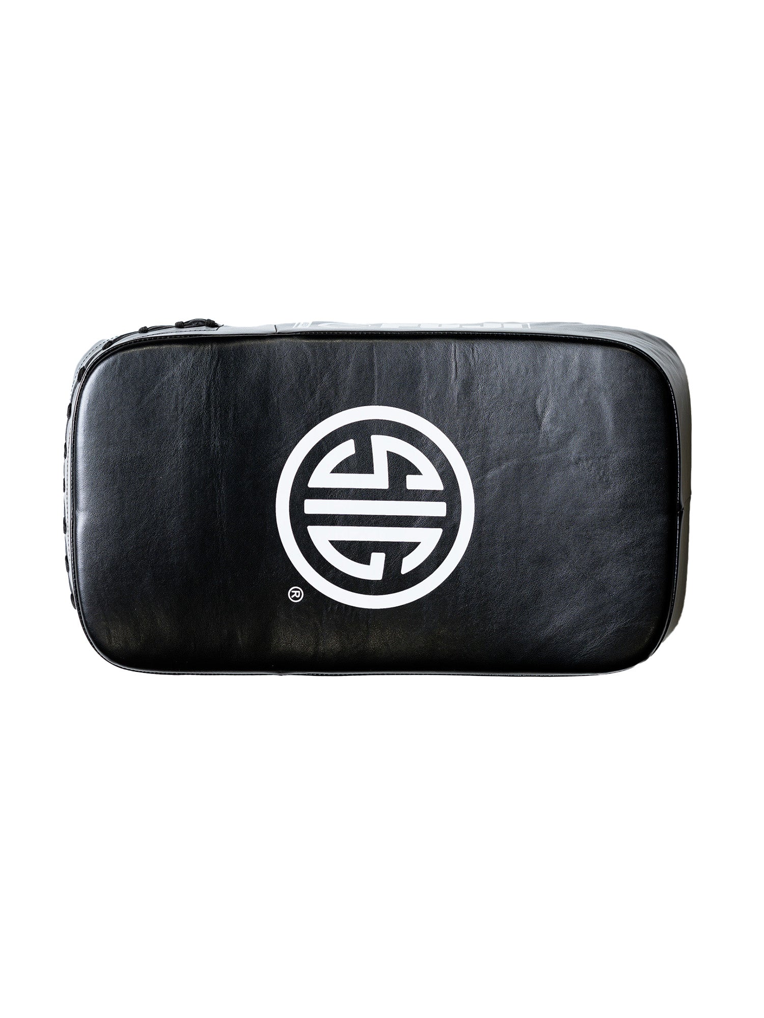 A pair of black Sig Sauer Thai Pads with a white circular geometric logo in the center, displayed against a white background.