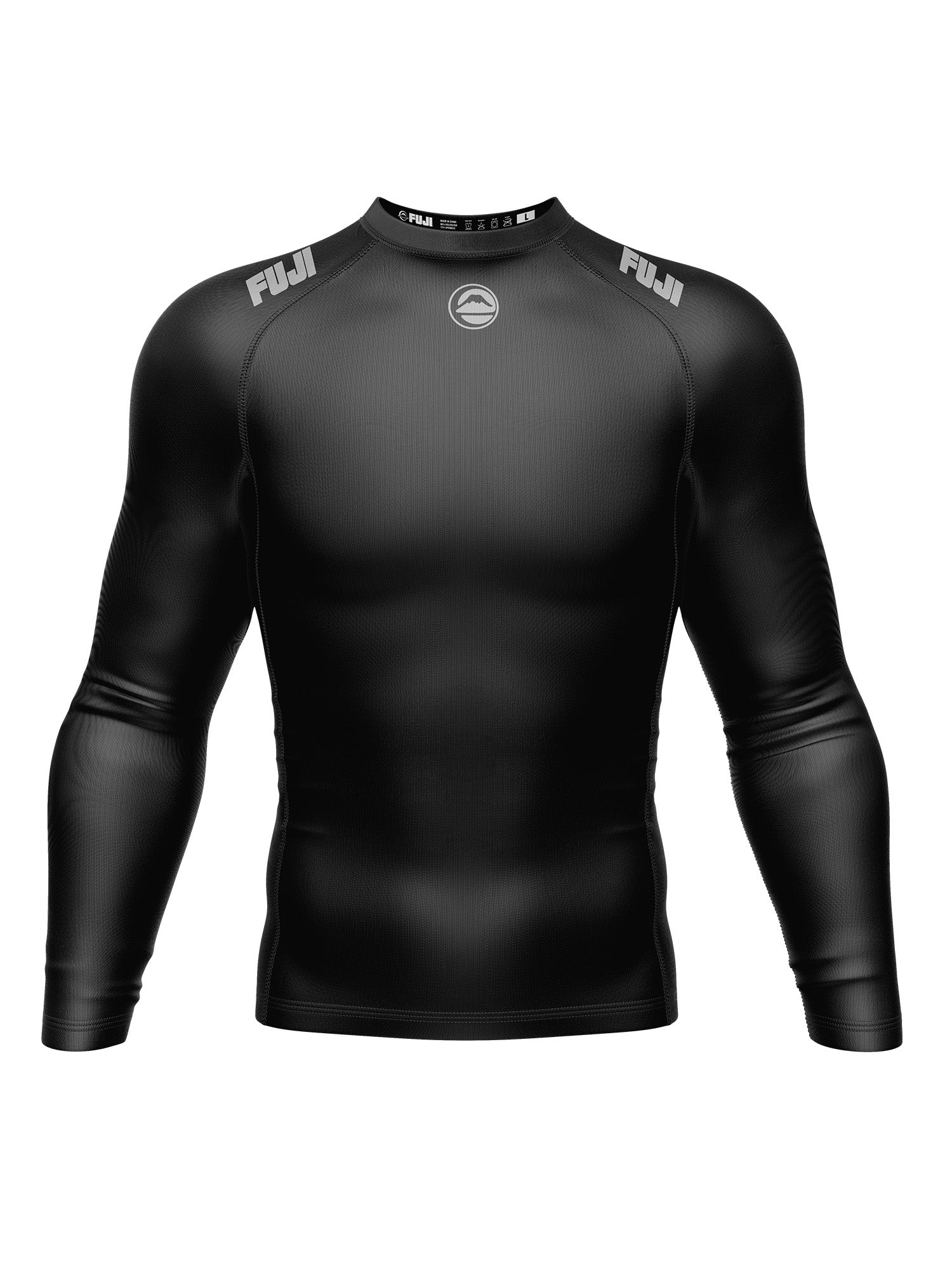 The Kids Baseline 2.0 Long Sleeve Rashguard Black features FUJI in white on both shoulders and a small circular logo on the chest, shown on an invisible mannequin against a white background.